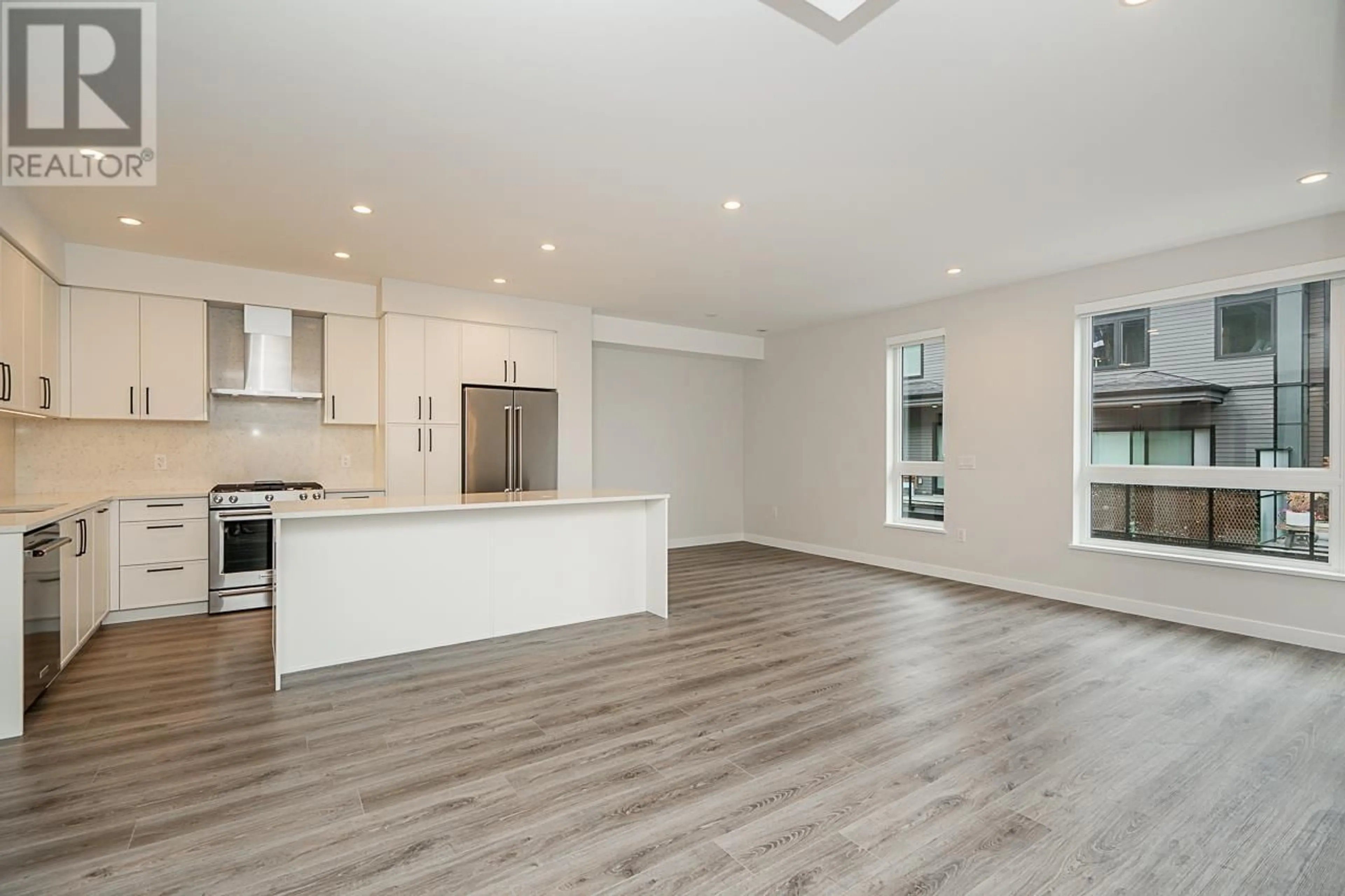Open concept kitchen, wood/laminate floor for 23 - 50 SEAVIEW DRIVE, Port Moody British Columbia V3H0N2