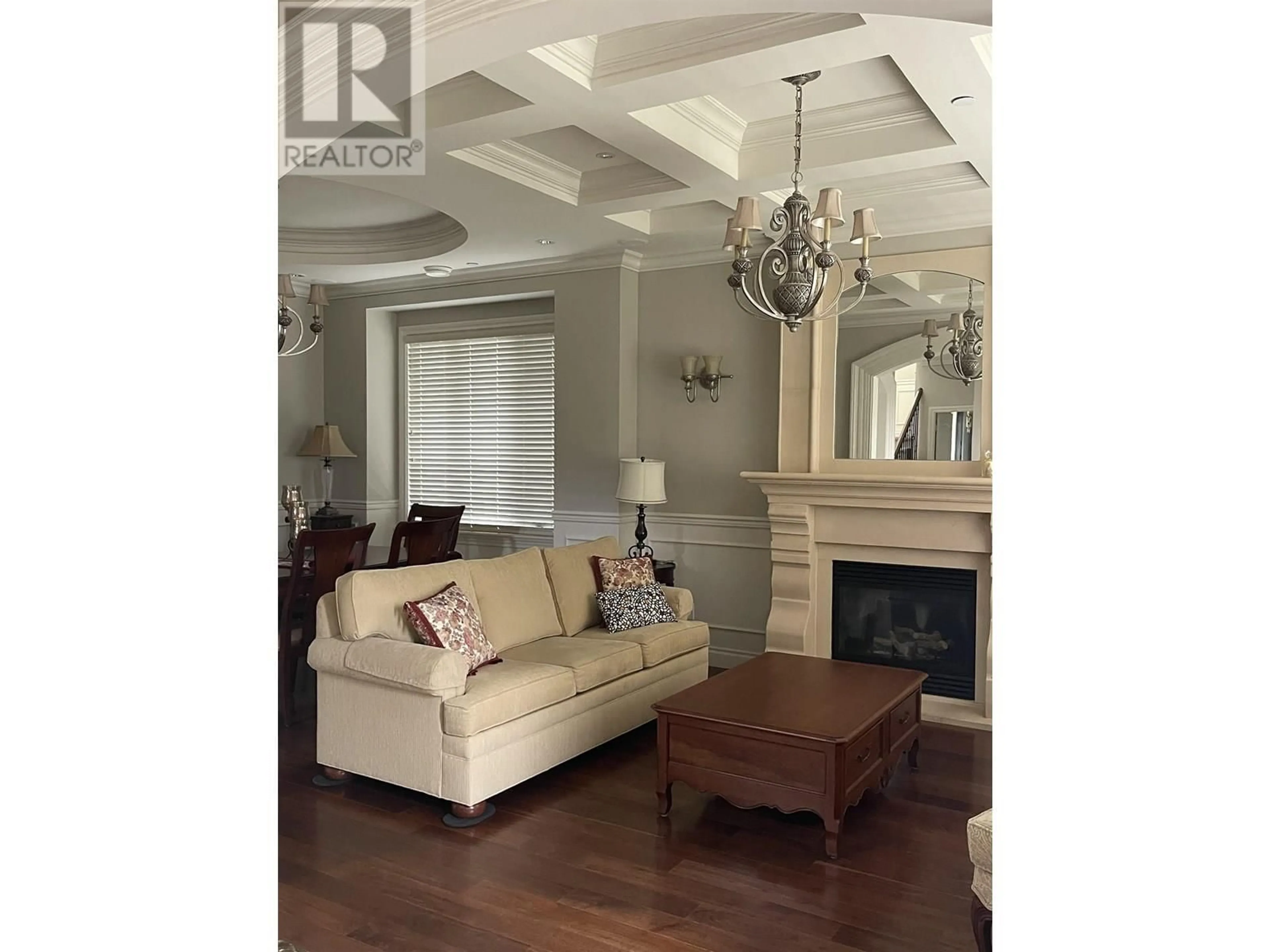 Living room with furniture, wood/laminate floor for 3125 38TH AVENUE, Vancouver British Columbia V6N2X4