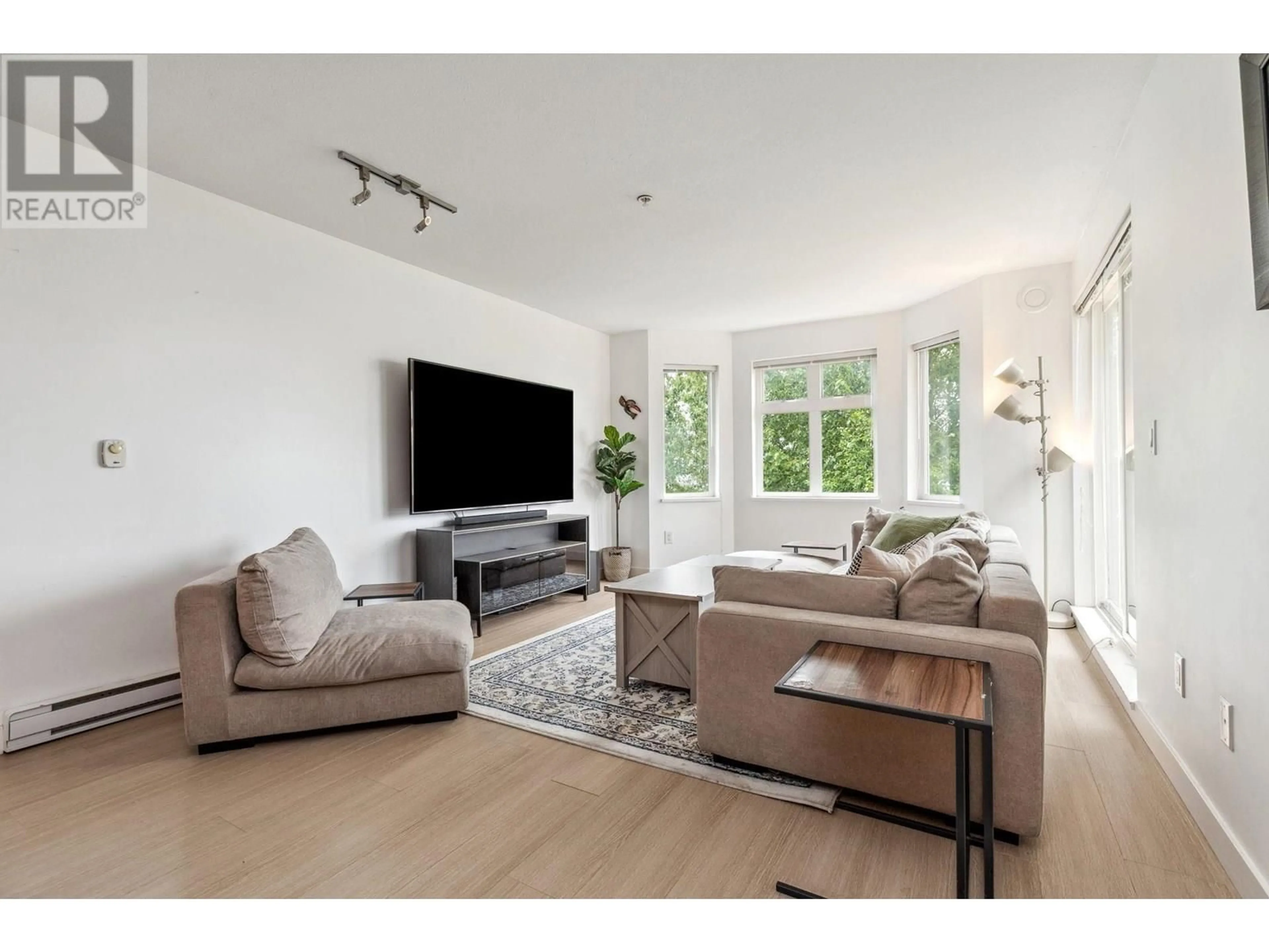 Living room with furniture, unknown for 501 - 160 SHORELINE CIRCLE, Port Moody British Columbia V3H0B2