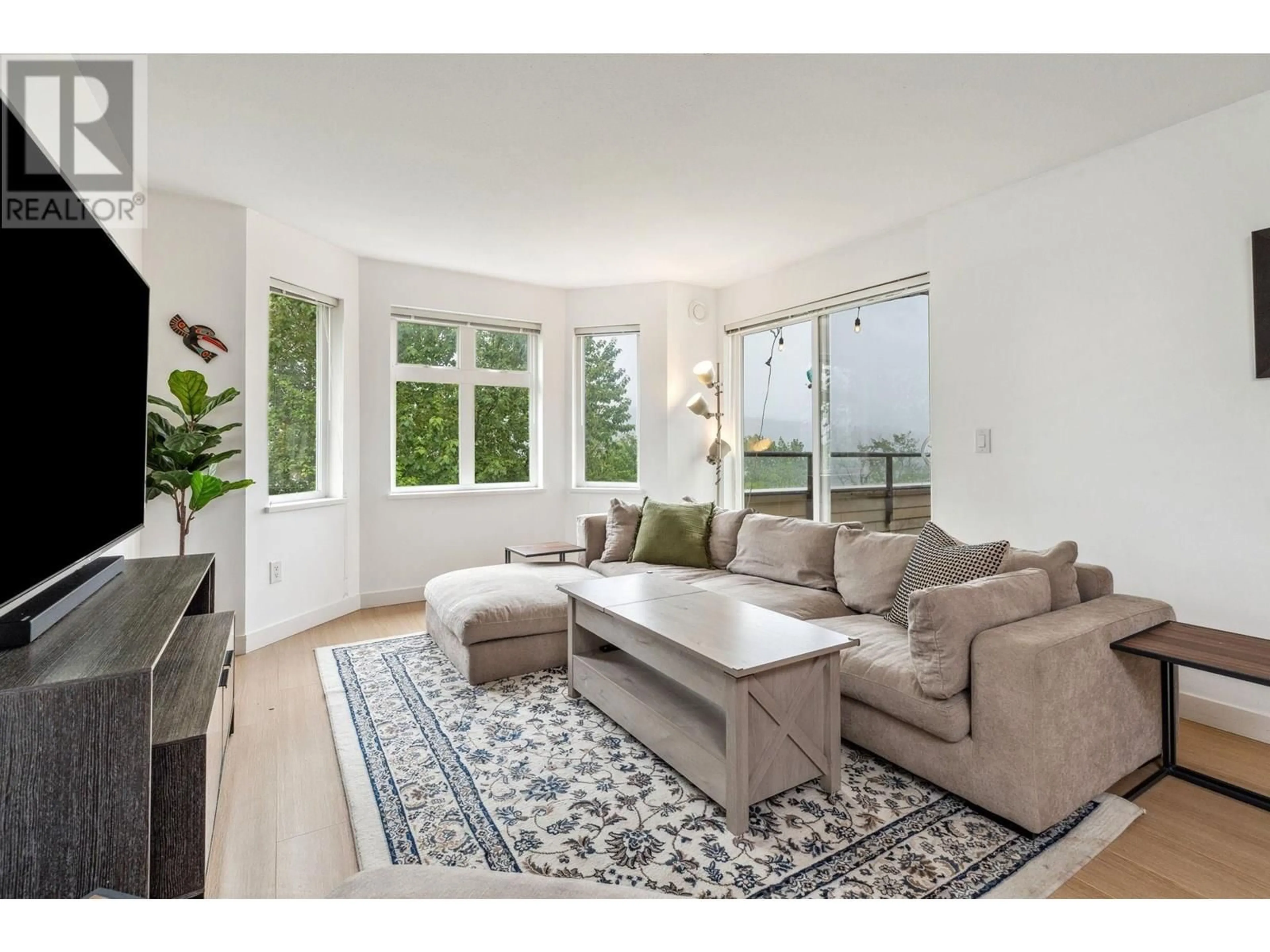 Living room with furniture, unknown for 501 - 160 SHORELINE CIRCLE, Port Moody British Columbia V3H0B2
