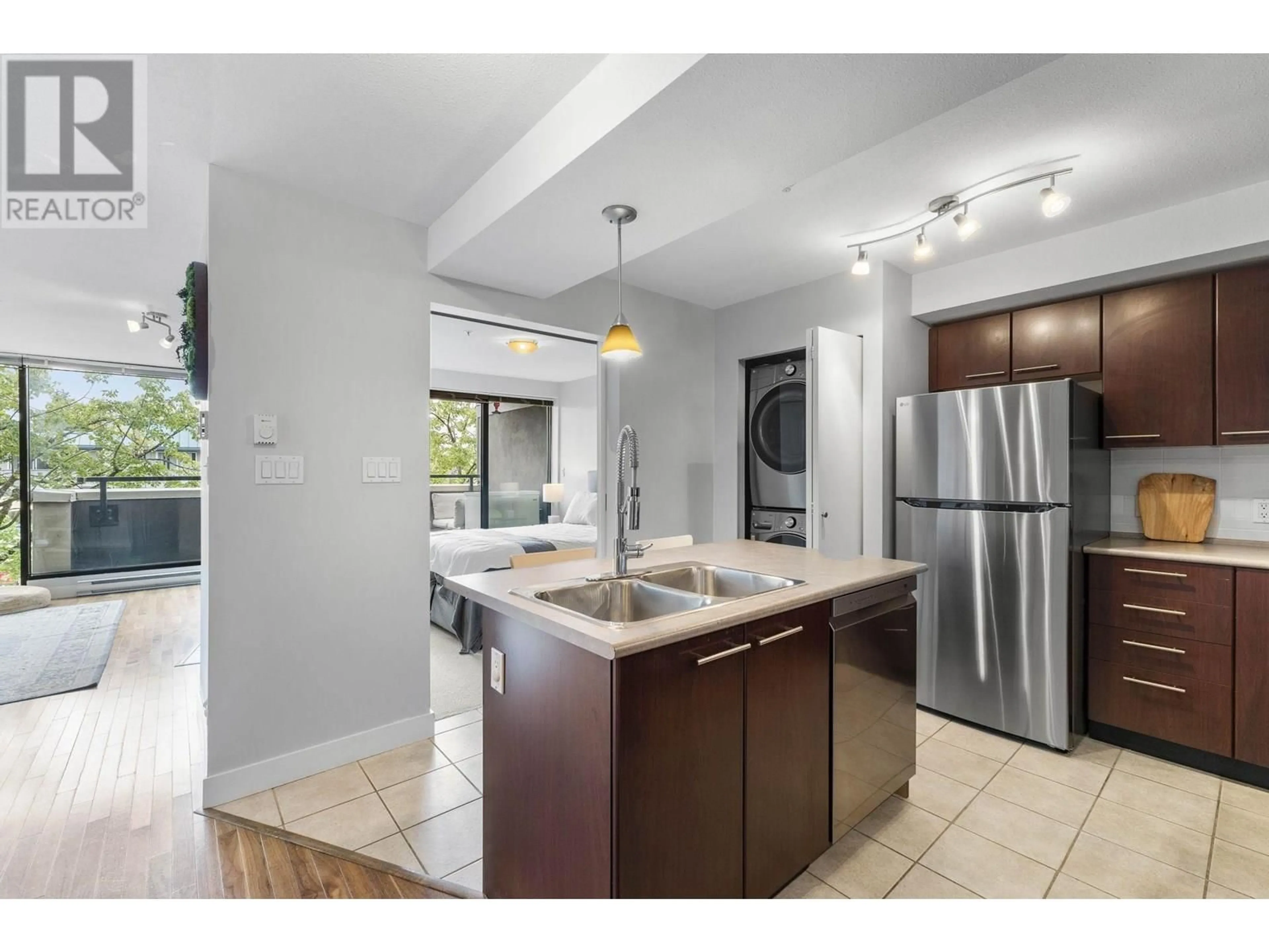 Open concept kitchen, ceramic/tile floor for 307 - 2525 BLENHEIM STREET, Vancouver British Columbia V6K4W6