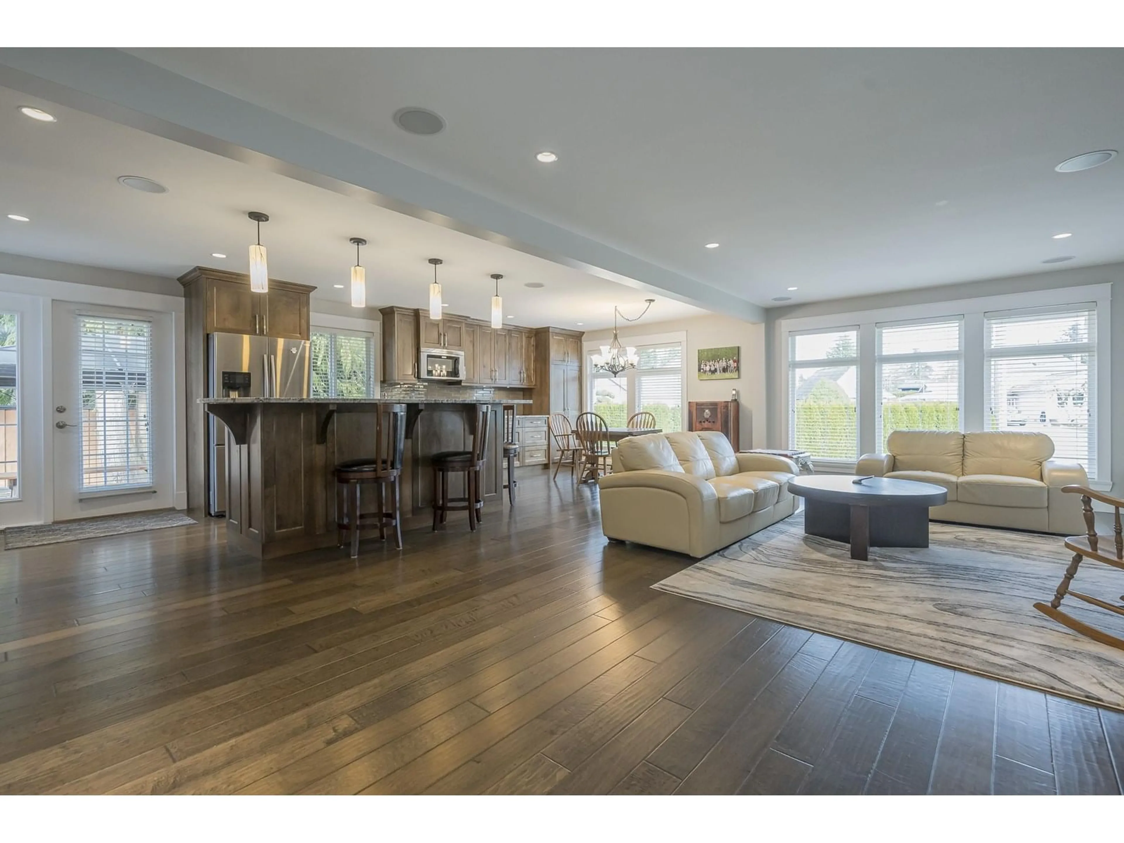 Open concept kitchen, wood/laminate floor for 5707 247A, Langley British Columbia V2Z1H2
