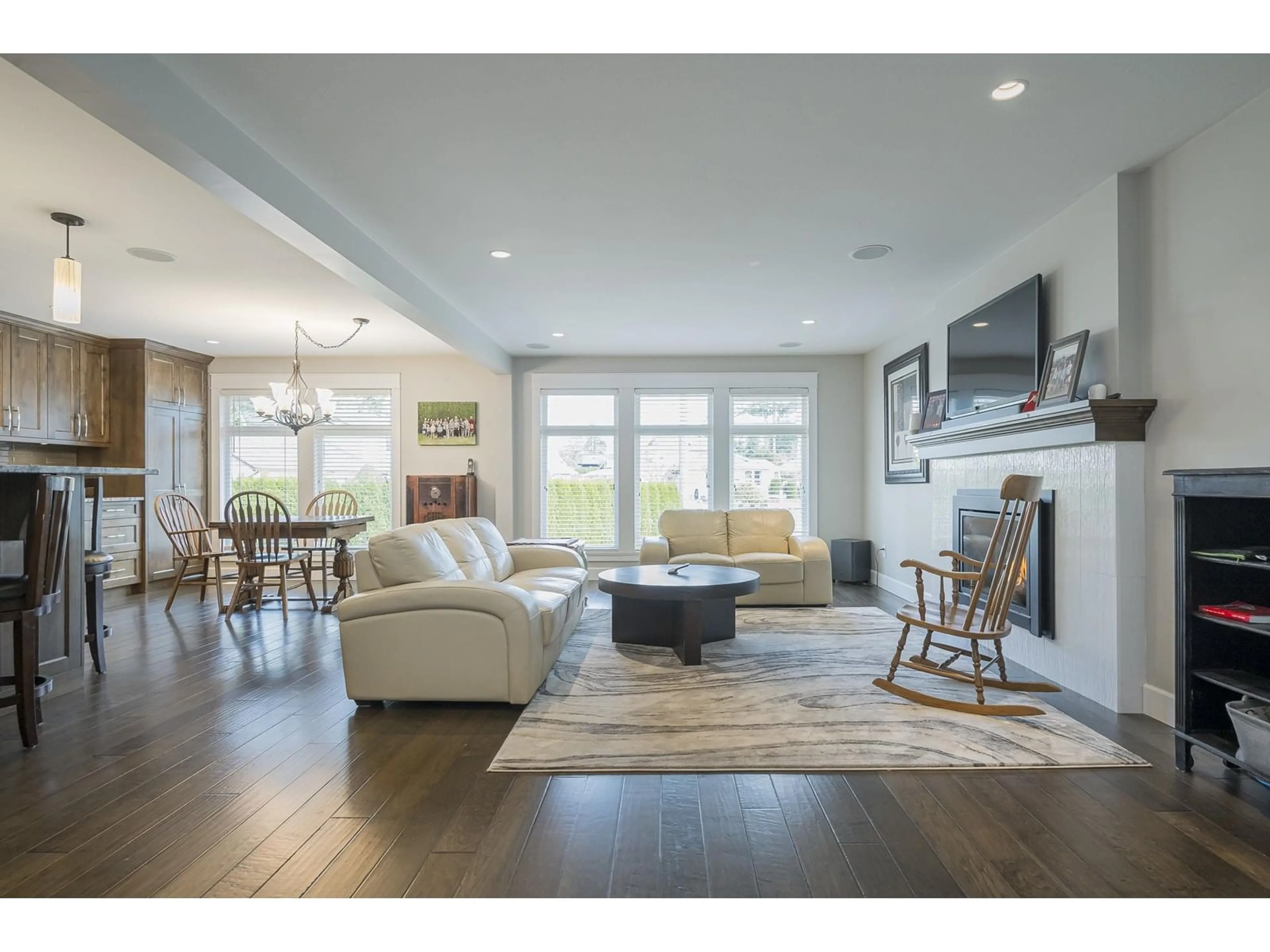 Living room with furniture, wood/laminate floor for 5707 247A, Langley British Columbia V2Z1H2
