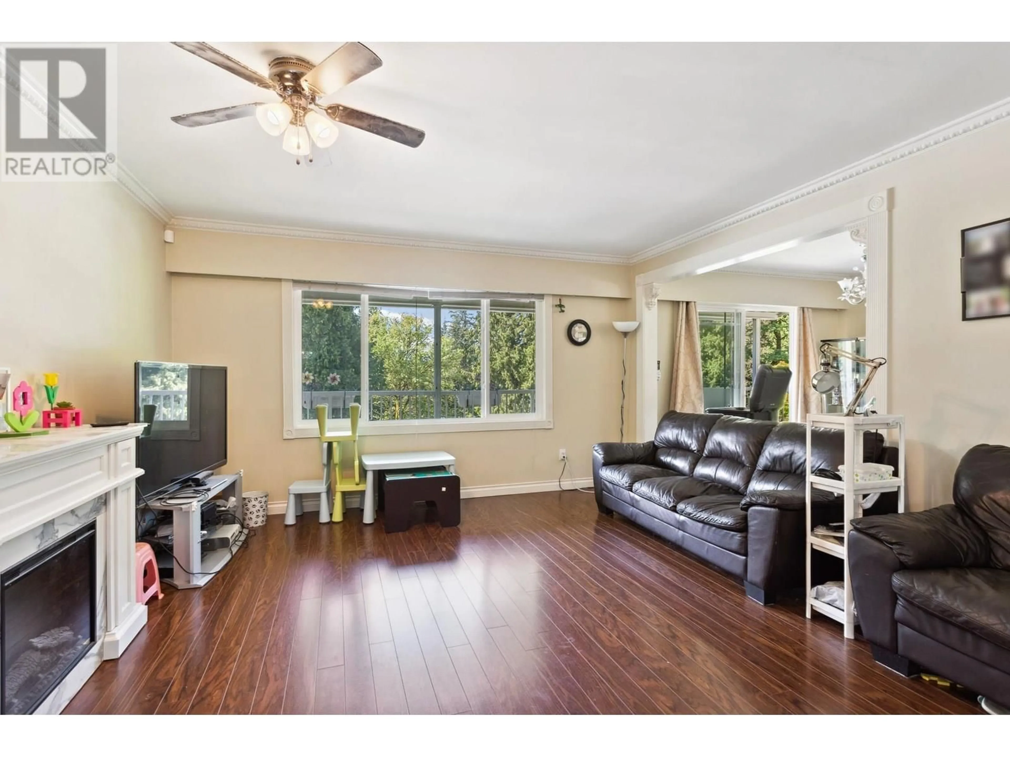 Living room with furniture, wood/laminate floor for 8224 WEDGEWOOD STREET, Burnaby British Columbia V3N1C4