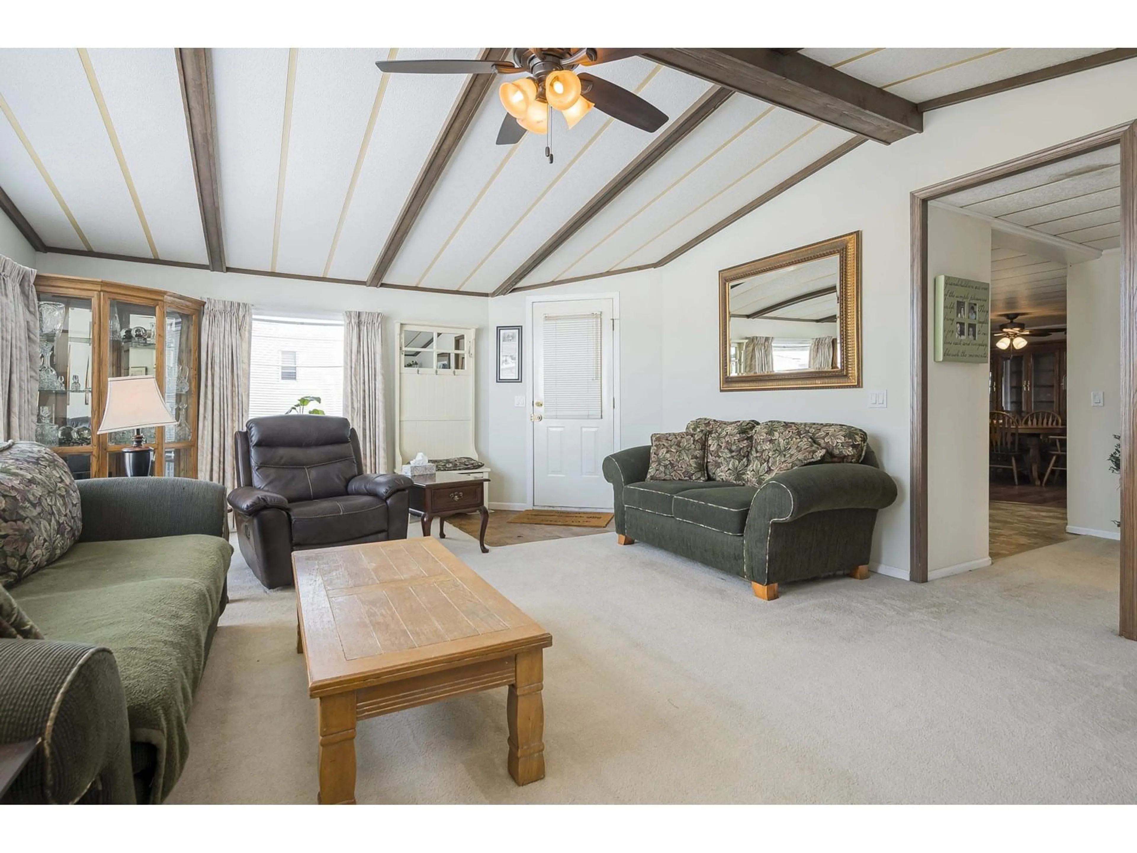 Living room with furniture, wood/laminate floor for 141 - 27111 0, Langley British Columbia V4W2T3