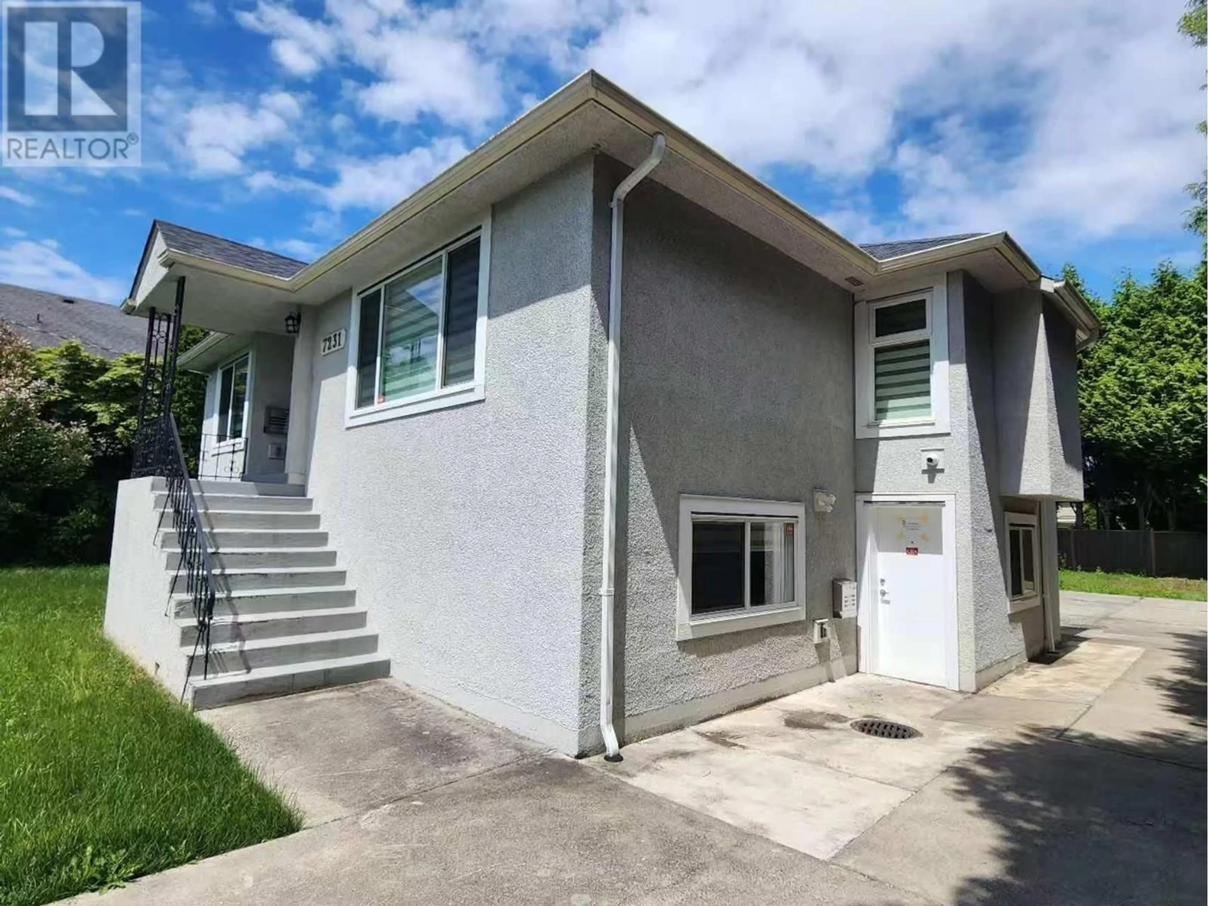 Home with vinyl exterior material, street for 7231 STEVESTON HIGHWAY, Richmond British Columbia V7A1L9