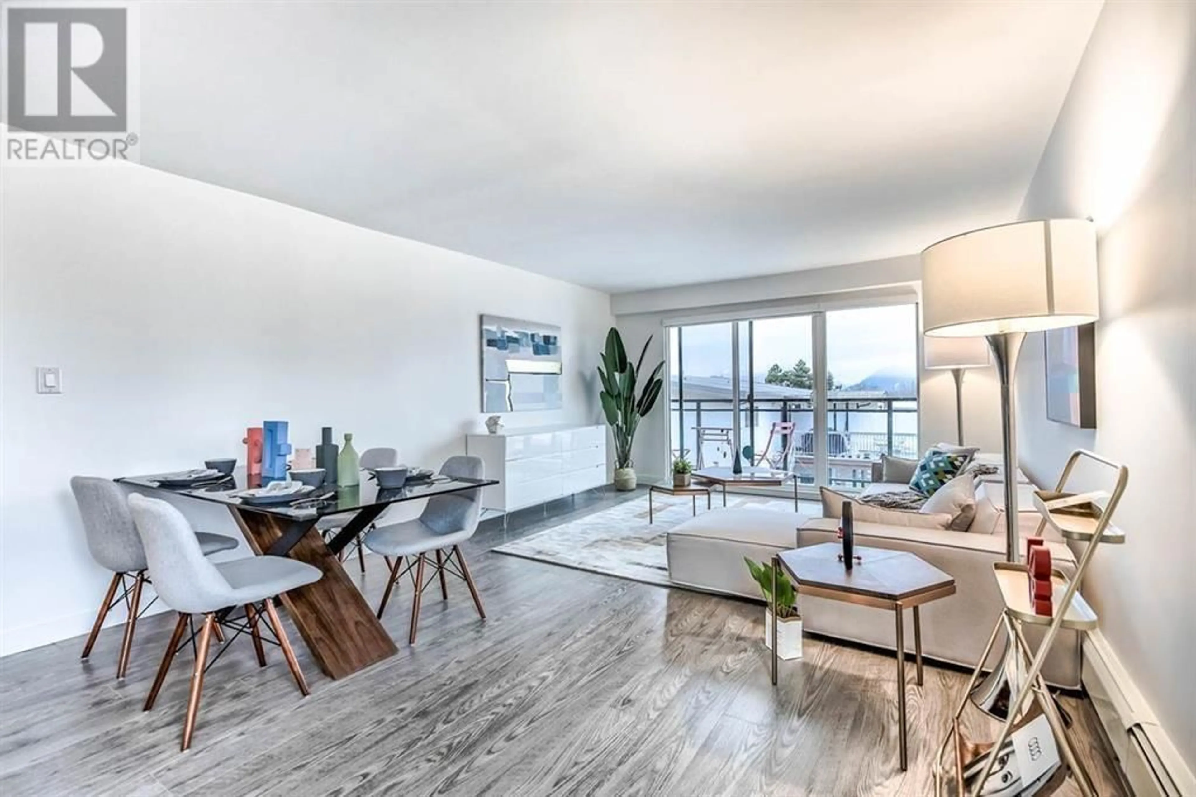 Living room with furniture, wood/laminate floor for 205 - 4625 GRANGE STREET, Burnaby British Columbia V5H1R1