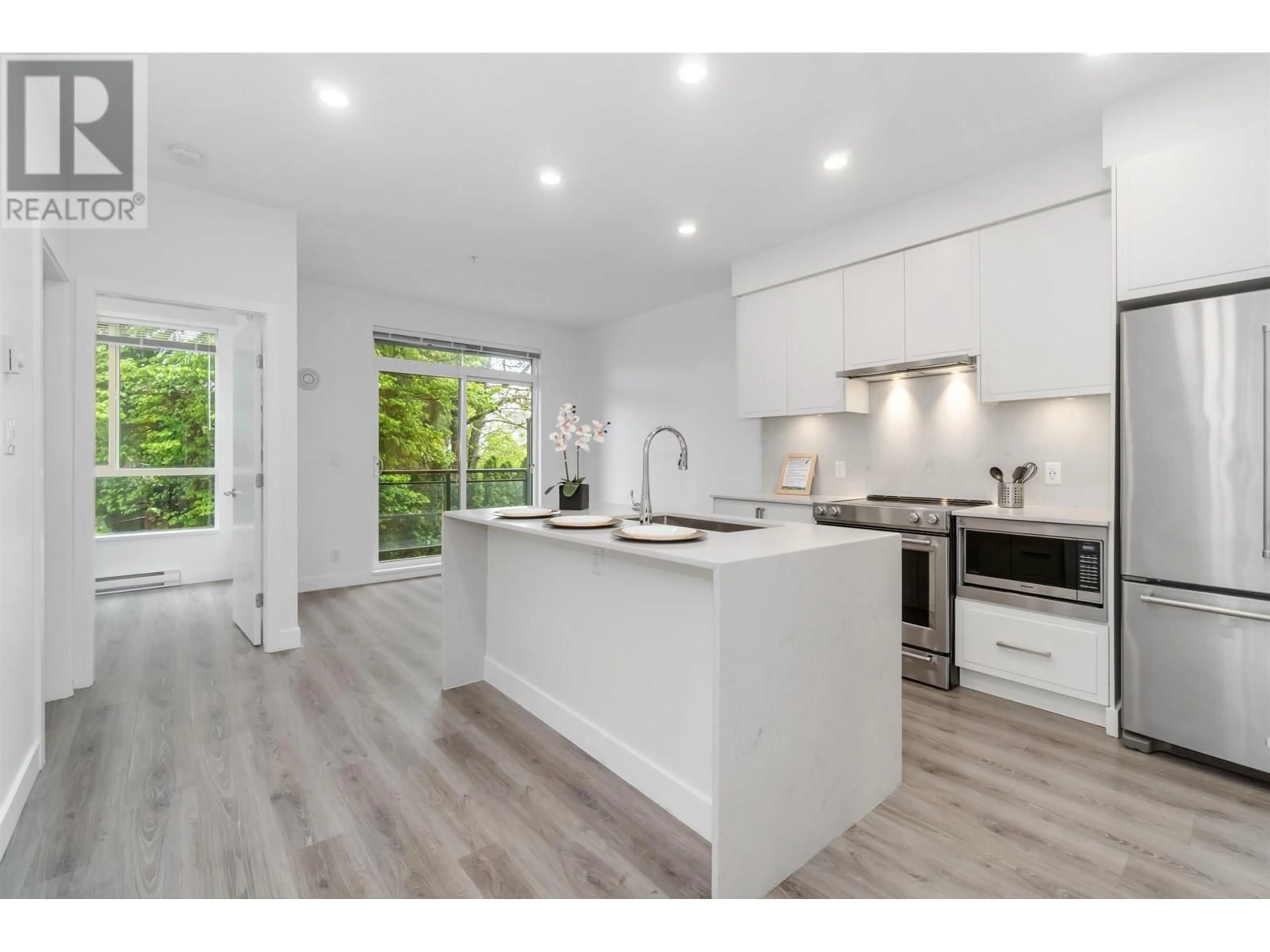 Open concept kitchen, unknown for 301 - 700 CLARKE ROAD, Coquitlam British Columbia V3J3Y1