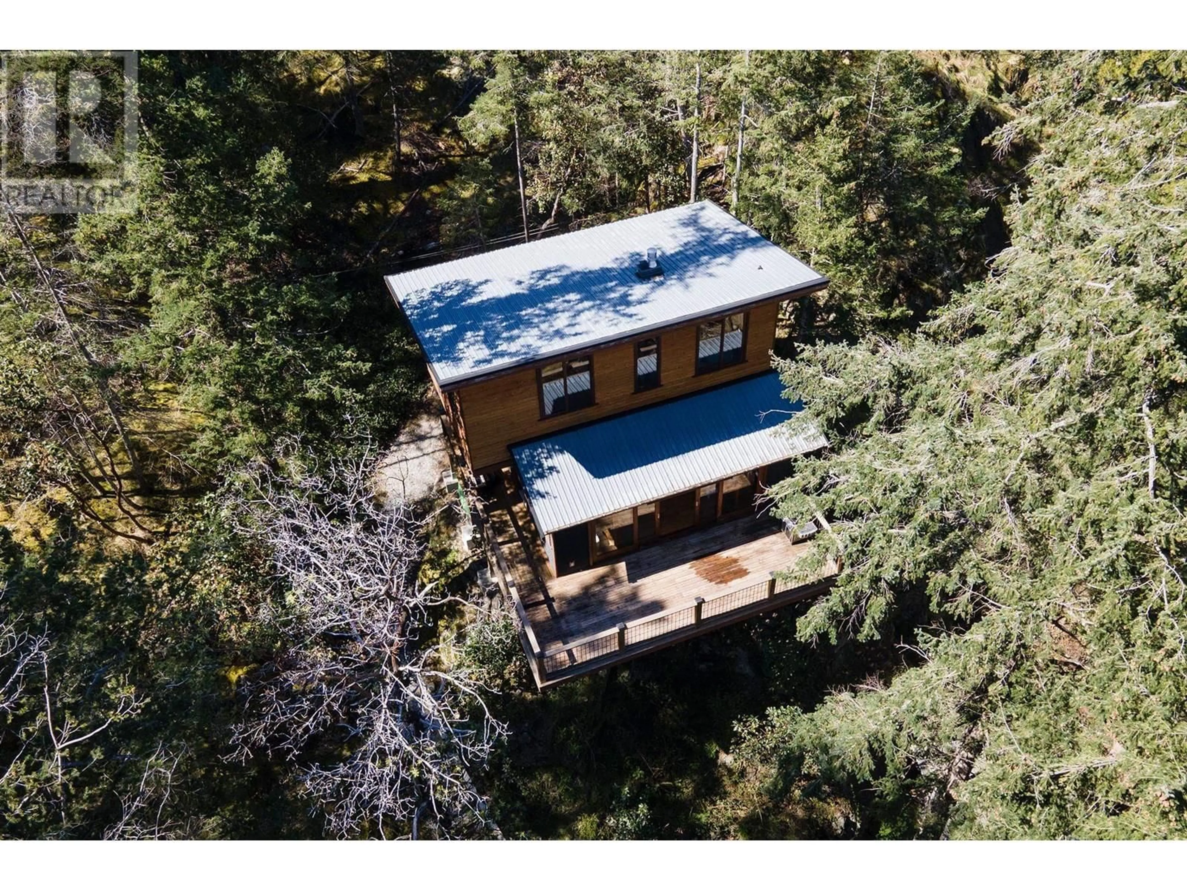 A pic from outside/outdoor area/front of a property/back of a property/a pic from drone, forest/trees view for 5063 SHERMAN LANE, Halfmoon Bay British Columbia V7Z1G6