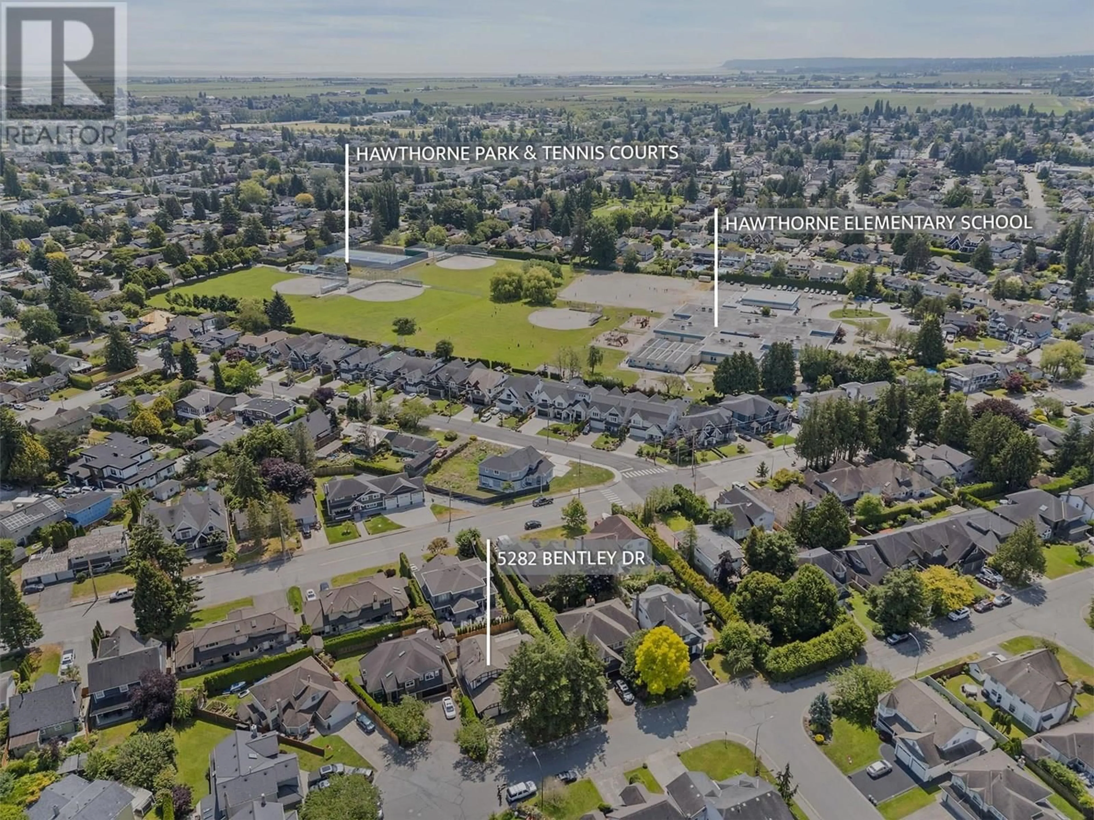 A pic from outside/outdoor area/front of a property/back of a property/a pic from drone, street for 5282 BENTLEY DRIVE, Ladner British Columbia V4K4J3