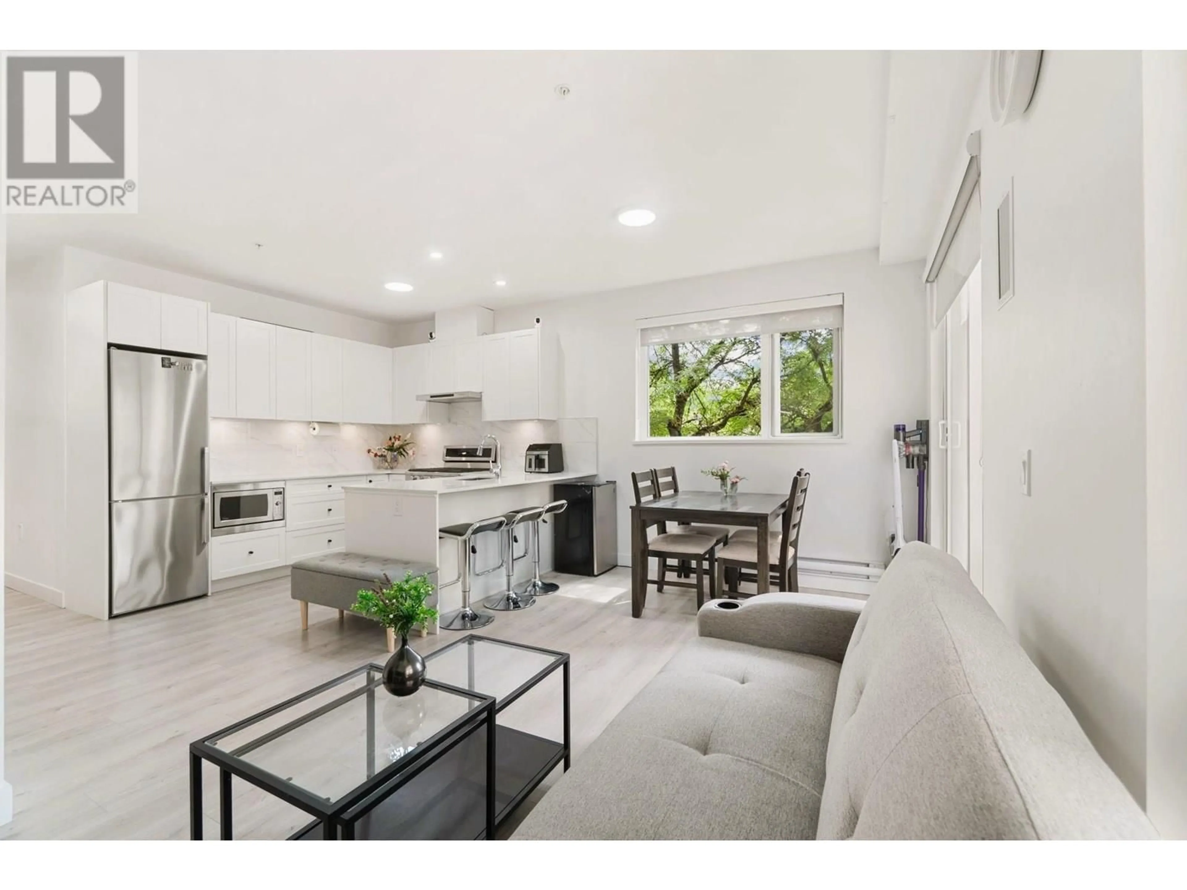 Open concept kitchen, ceramic/tile floor for 206 - 2688 DUKE STREET, Vancouver British Columbia V5R4S9