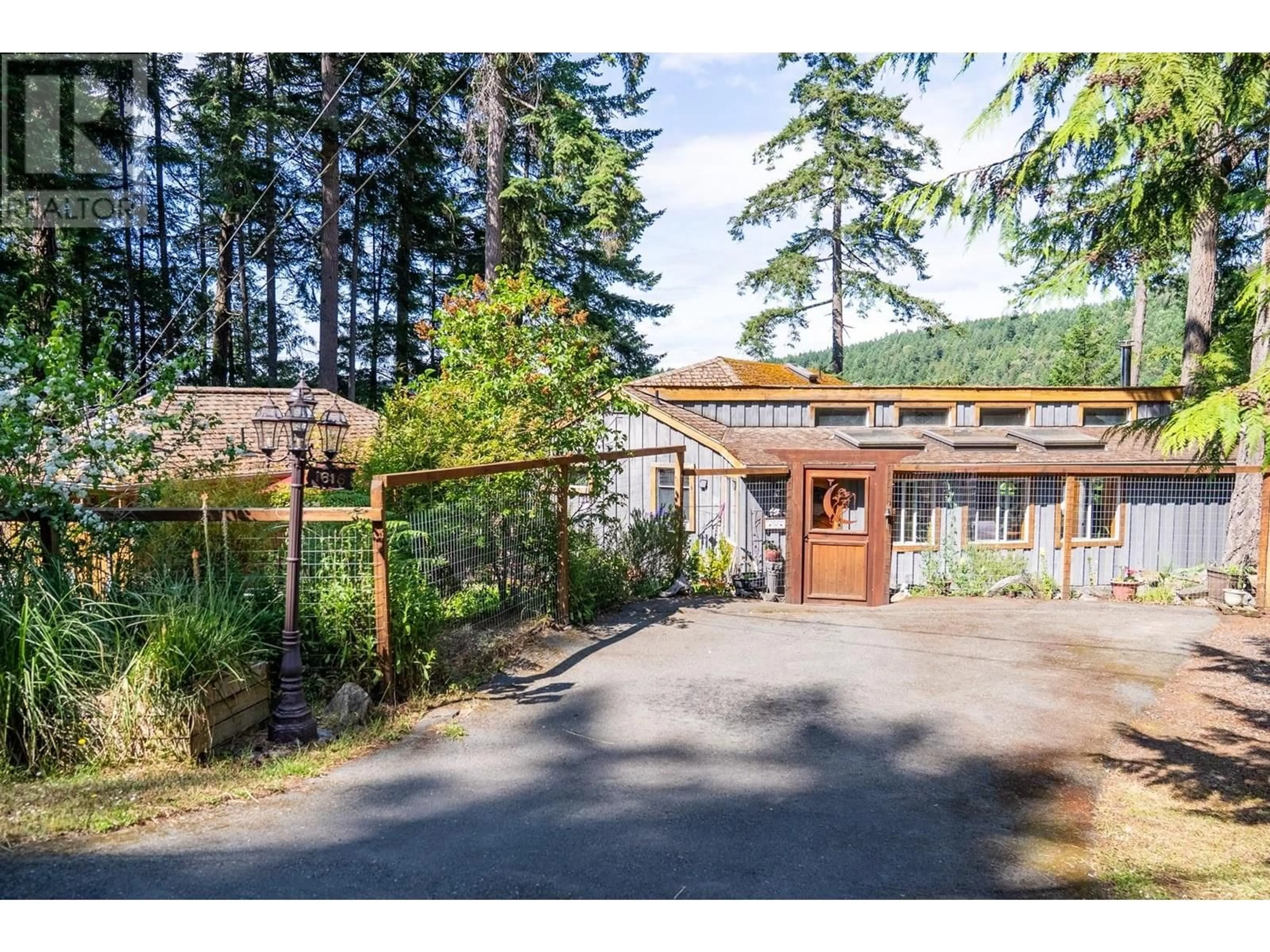 A pic from outside/outdoor area/front of a property/back of a property/a pic from drone, mountain view for 1616 SCHOONER WAY, Pender Island British Columbia V0N2M2