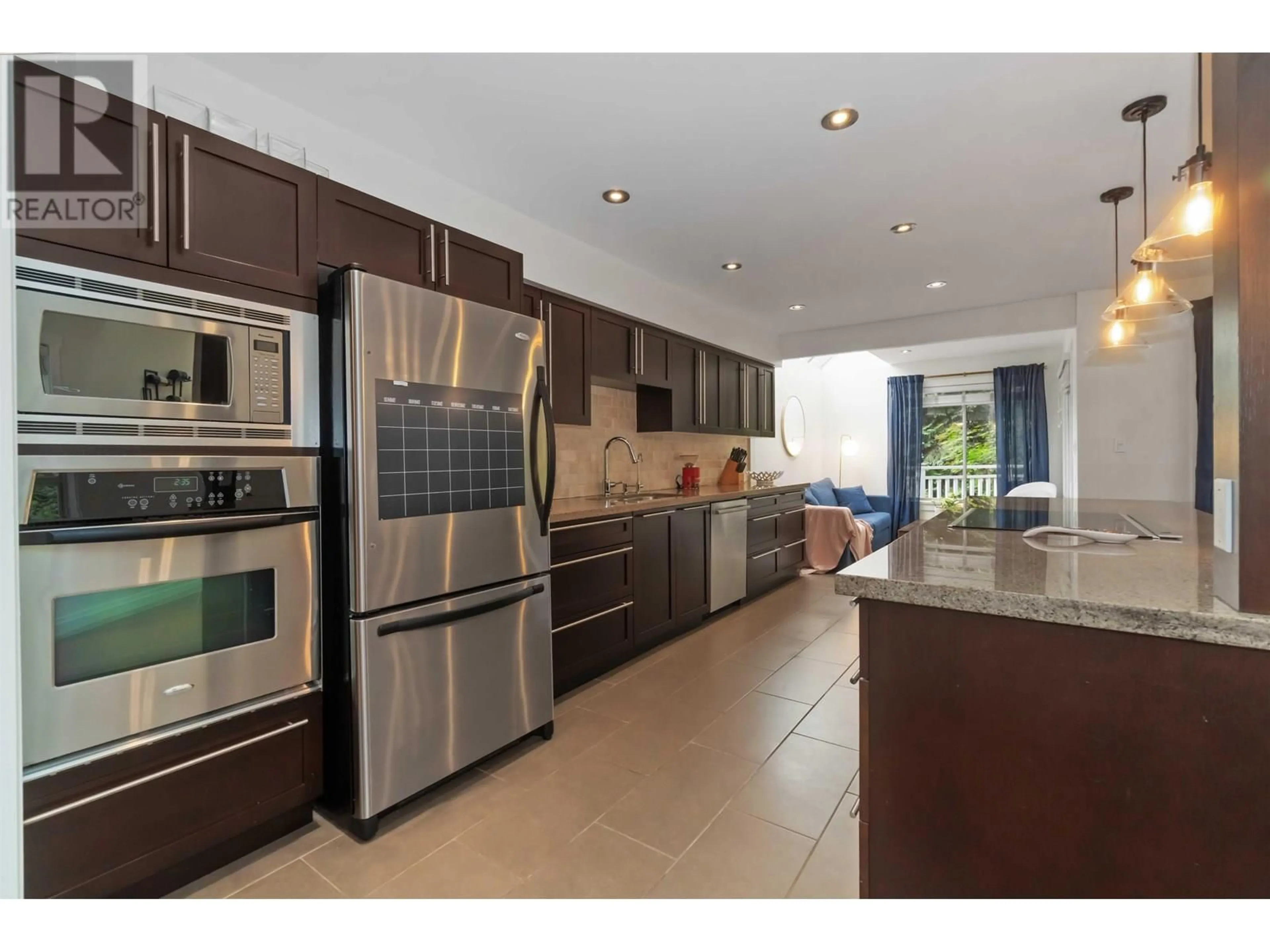 Open concept kitchen, ceramic/tile floor for 739 QUEENS ROAD, North Vancouver British Columbia V7N2L4