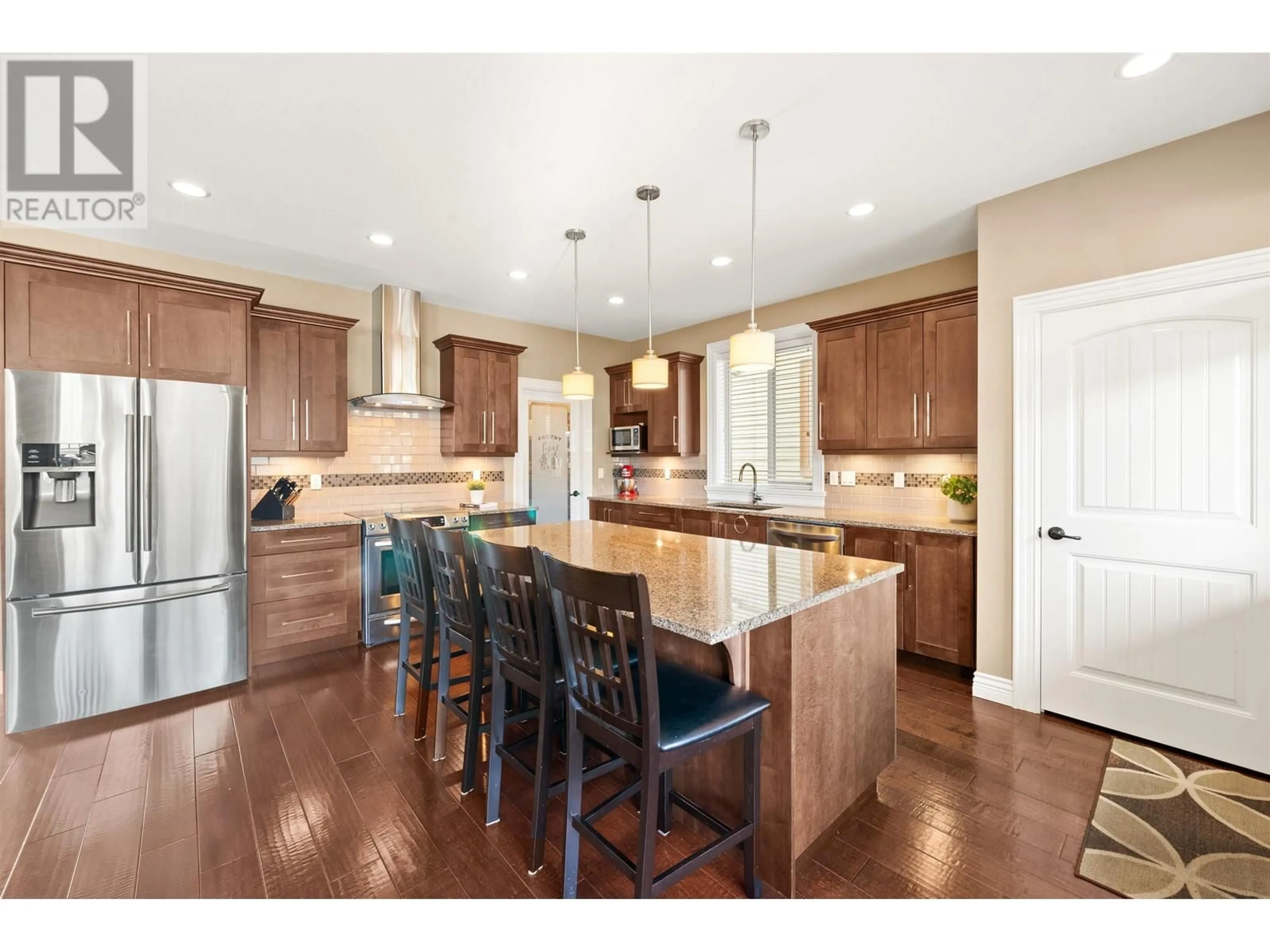 Open concept kitchen, wood/laminate floor for 1215 BURKEMONT PLACE, Coquitlam British Columbia V3B0C8