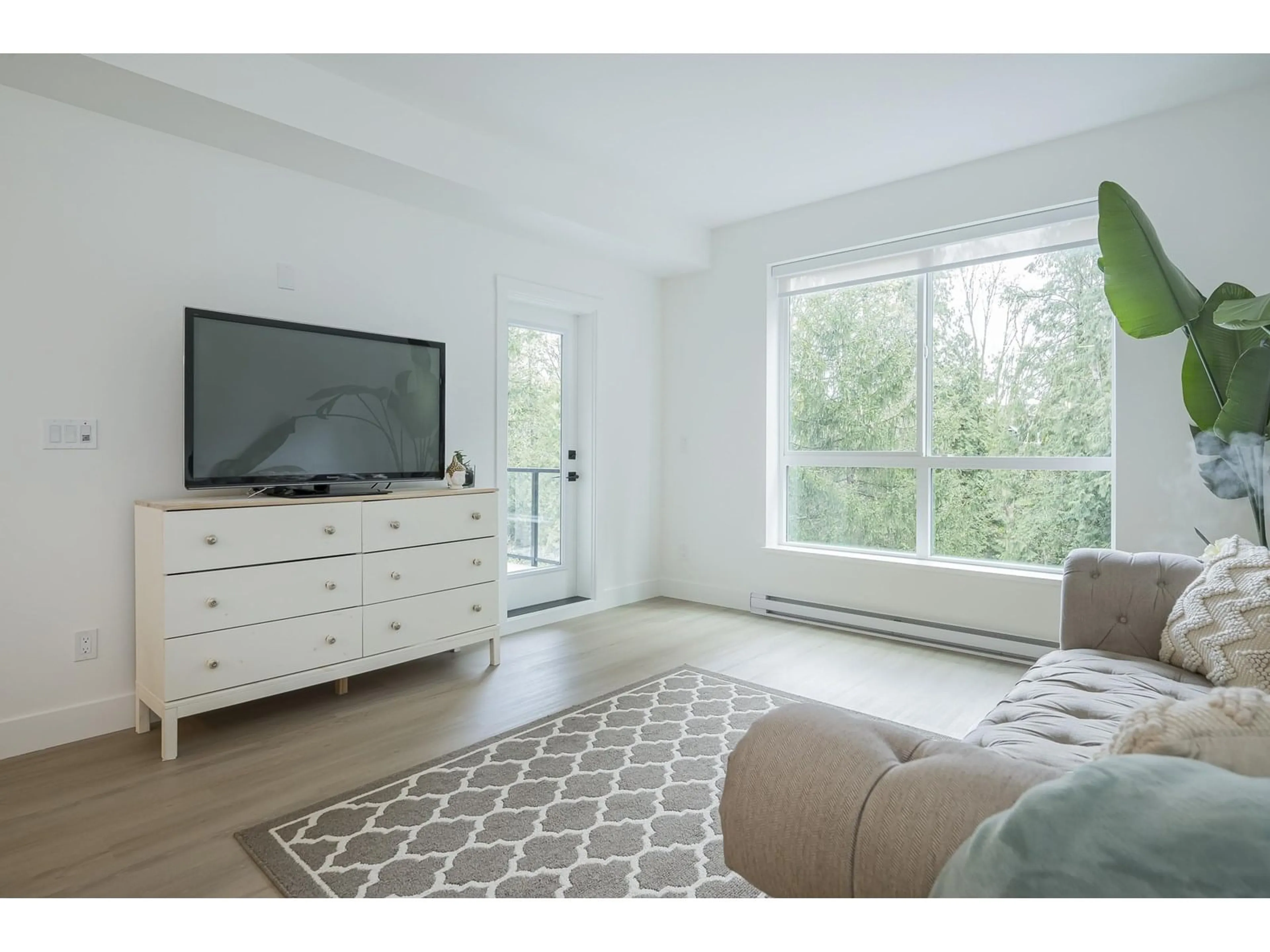 Living room with furniture, unknown for 409 - 3480 146A, Surrey British Columbia V3P0H6