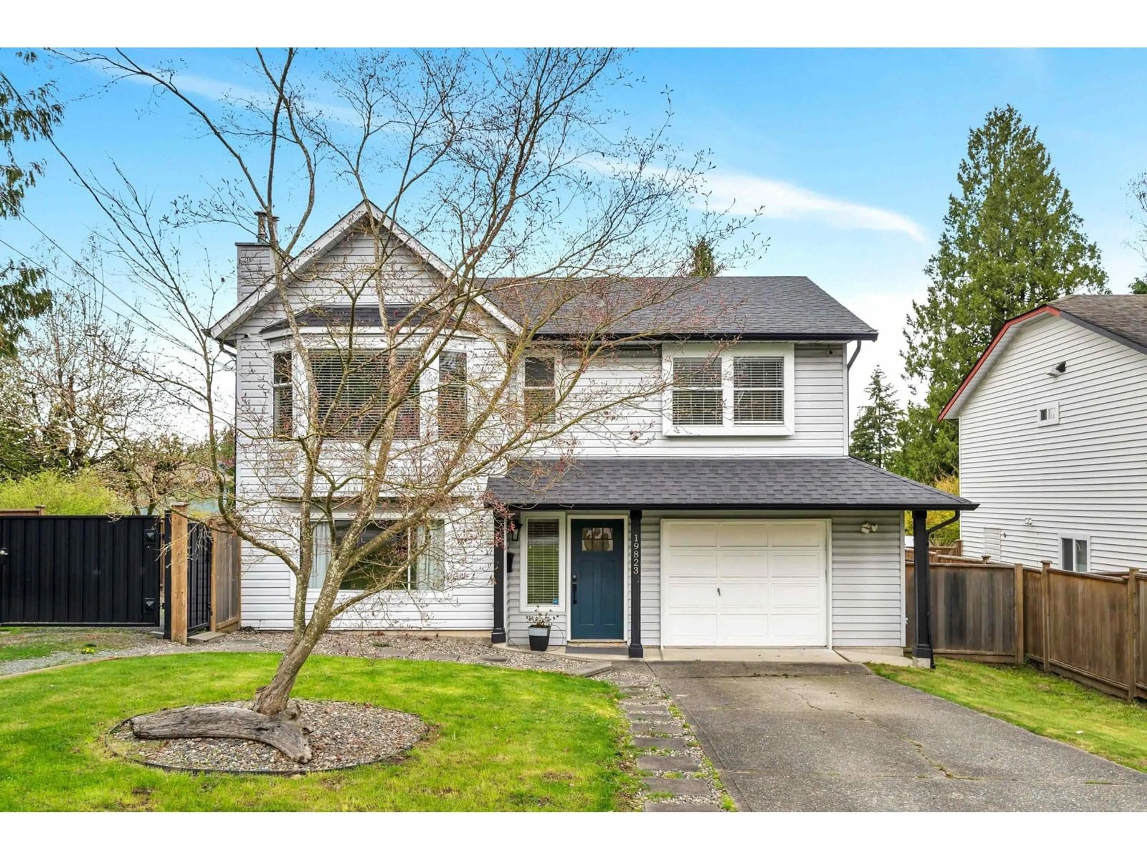 Home with vinyl exterior material, street for 19823 48, Langley British Columbia V3A3L2