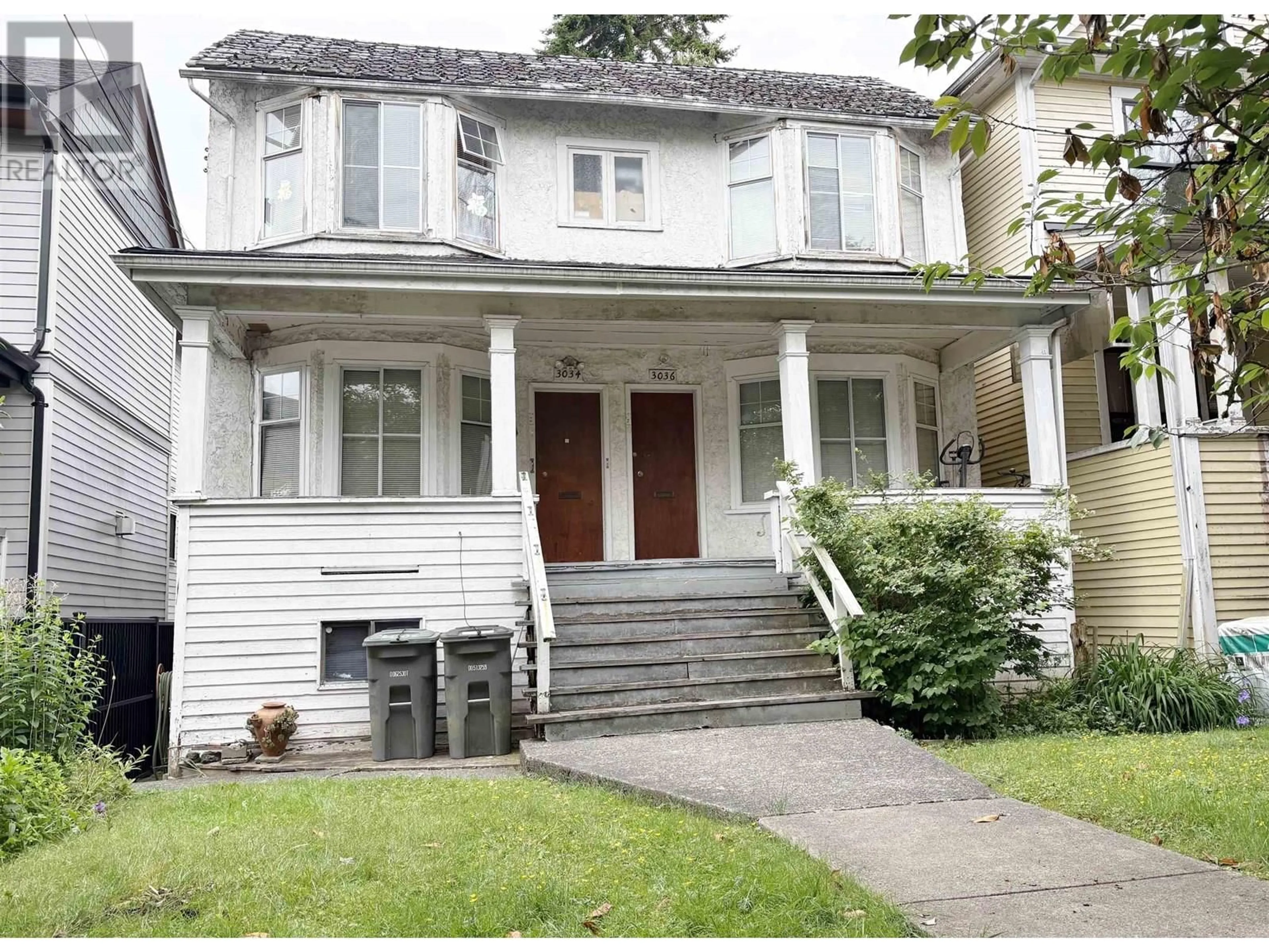 Home with vinyl exterior material, street for 3034 GLEN DRIVE, Vancouver British Columbia V5T4C1