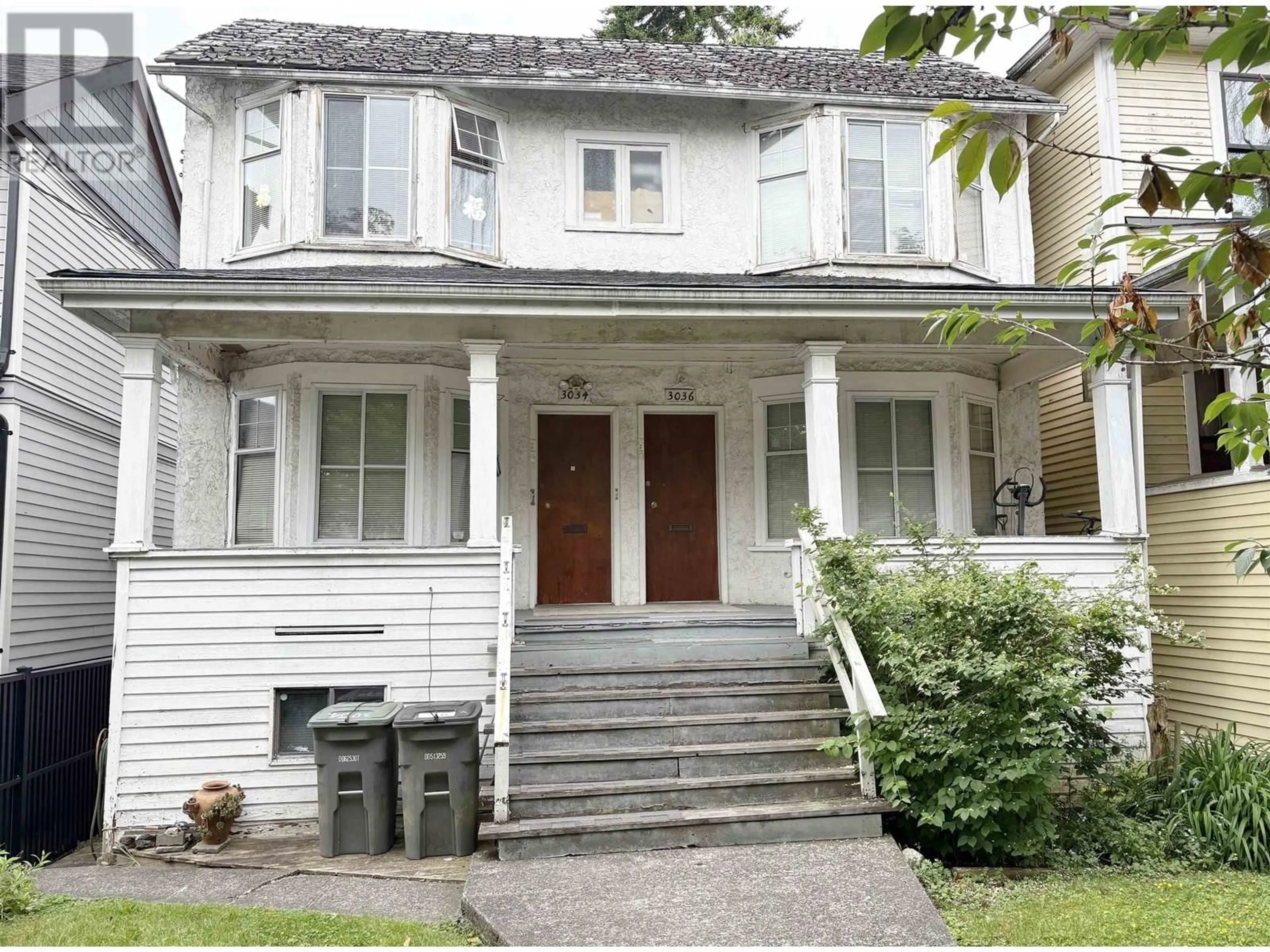 Home with vinyl exterior material, street for 3034 GLEN DRIVE, Vancouver British Columbia V5T4C1