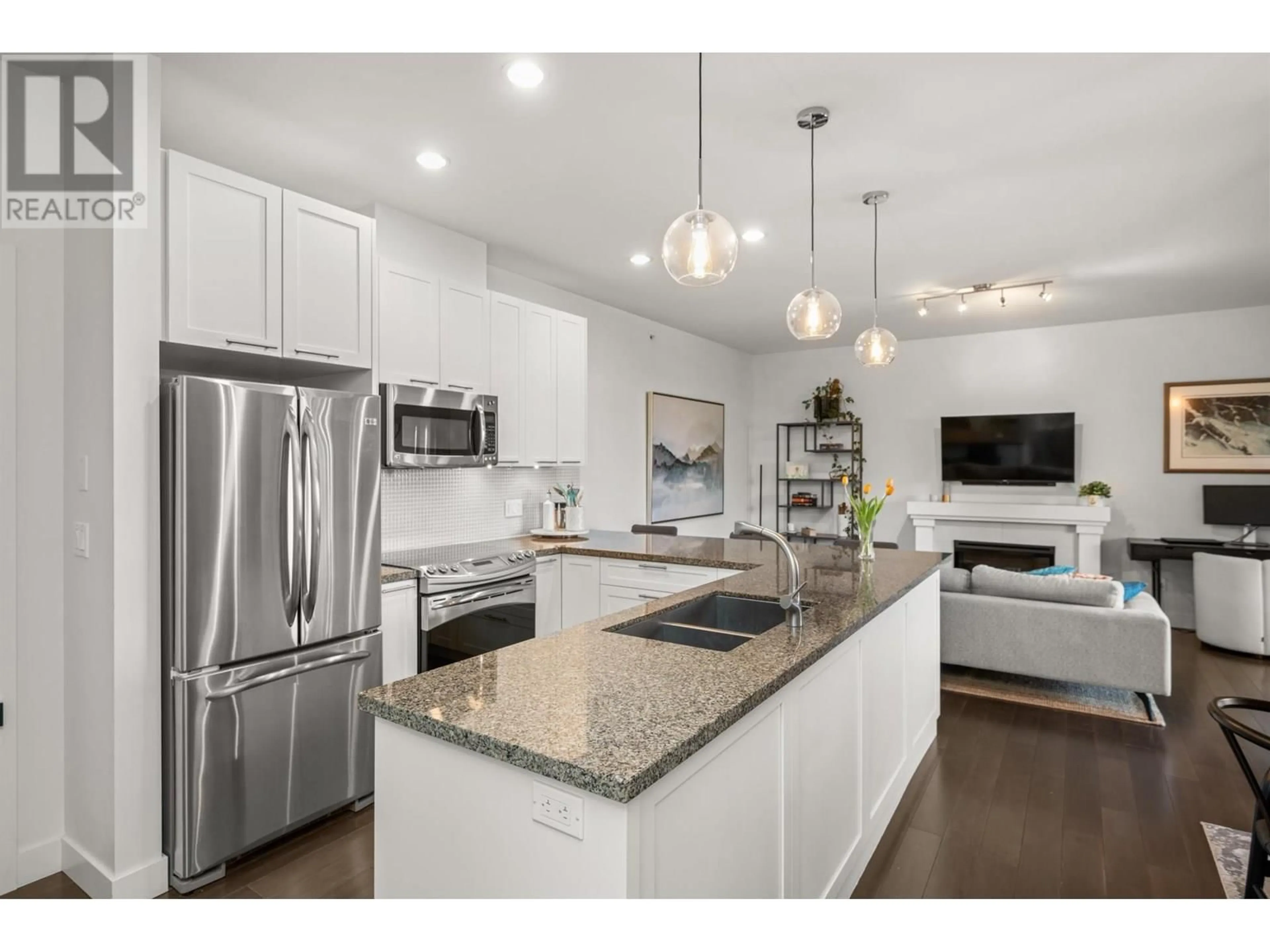 Open concept kitchen, unknown for 408 - 4689 52A STREET, Ladner British Columbia V4K2Y7