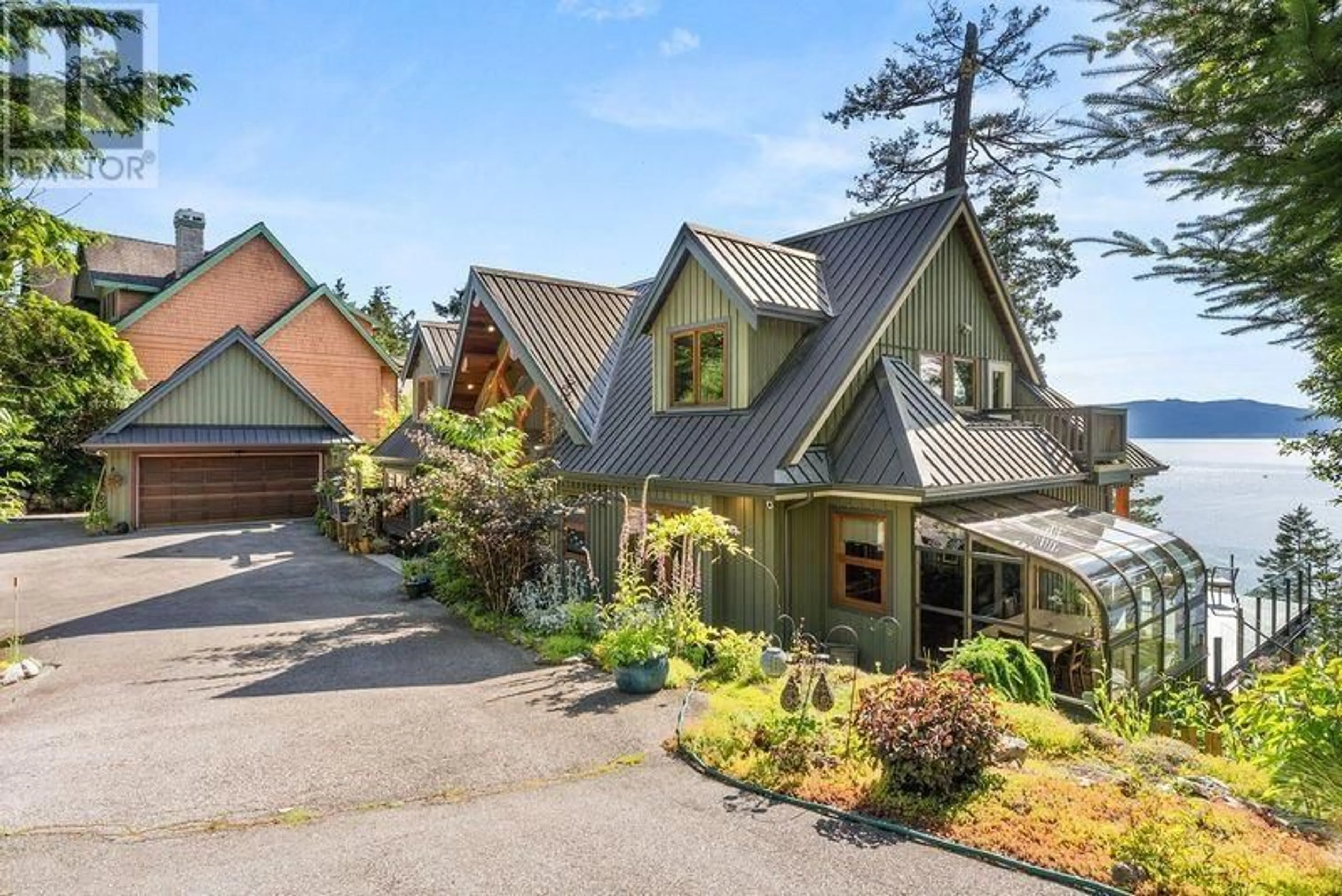 A pic from outside/outdoor area/front of a property/back of a property/a pic from drone, mountain view for 13543 SAKINAW DRIVE, Garden Bay British Columbia V0N1S1