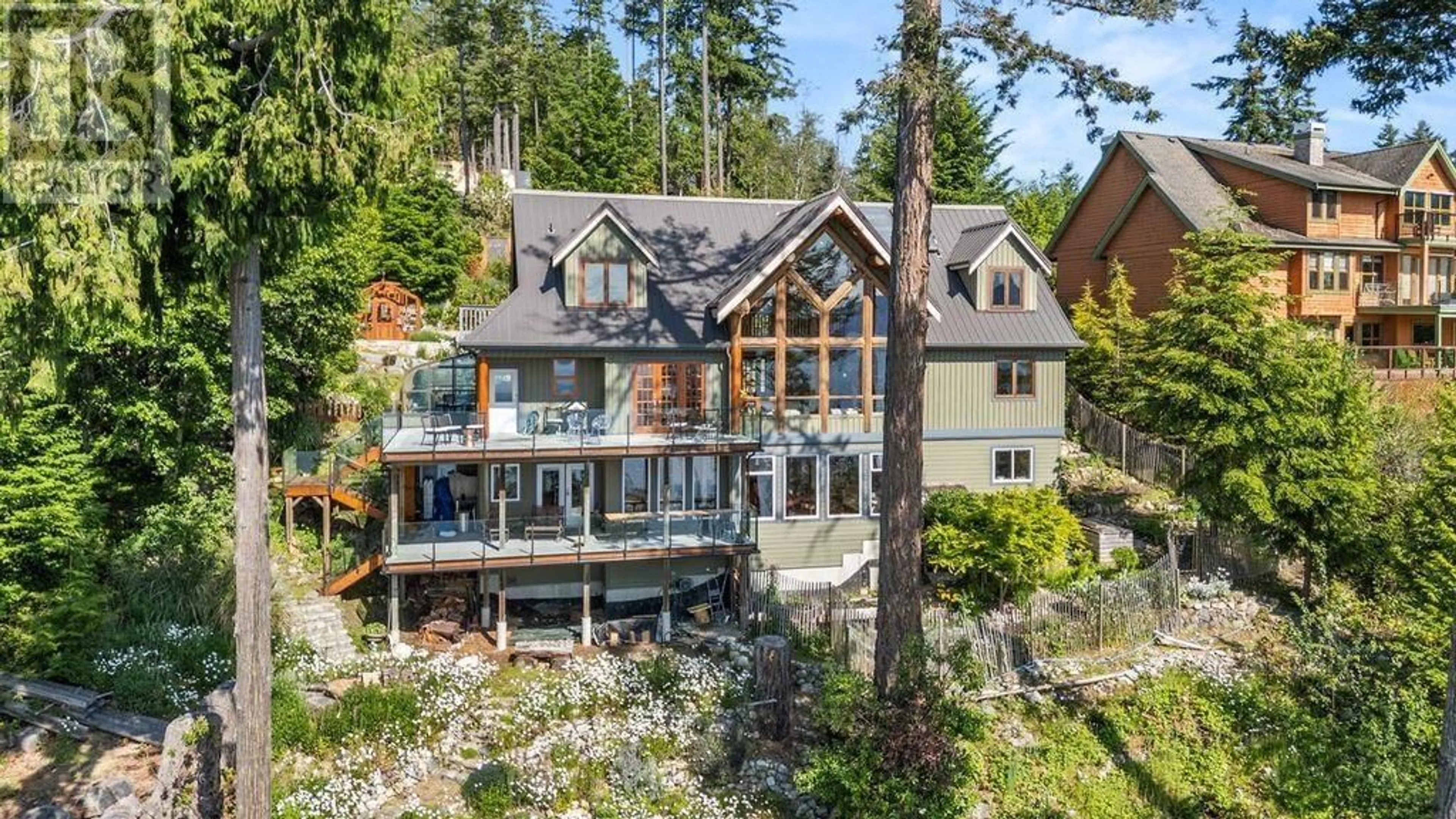 A pic from outside/outdoor area/front of a property/back of a property/a pic from drone, water/lake/river/ocean view for 13543 SAKINAW DRIVE, Garden Bay British Columbia V0N1S1