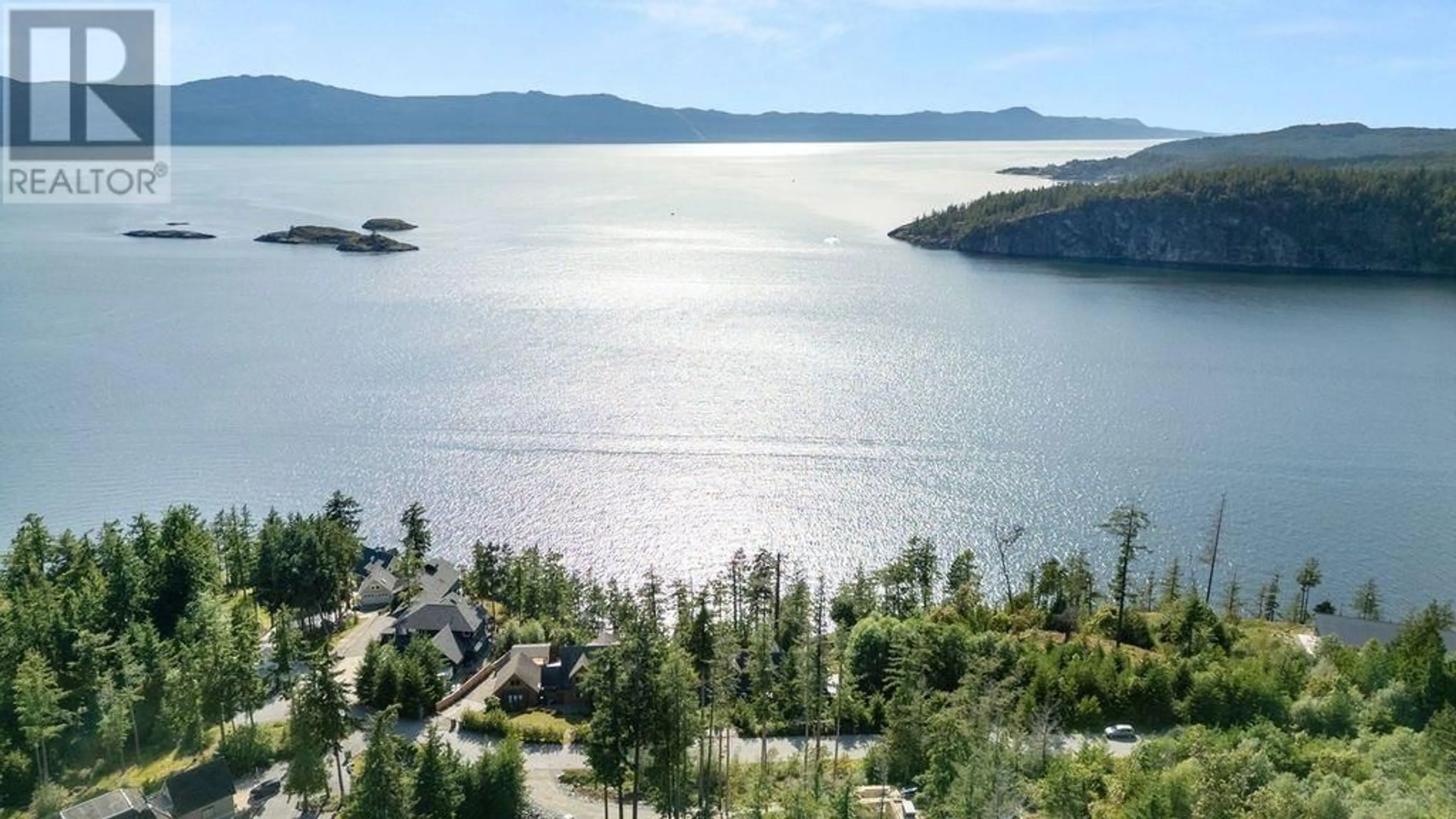 A pic from outside/outdoor area/front of a property/back of a property/a pic from drone, water/lake/river/ocean view for 13543 SAKINAW DRIVE, Garden Bay British Columbia V0N1S1