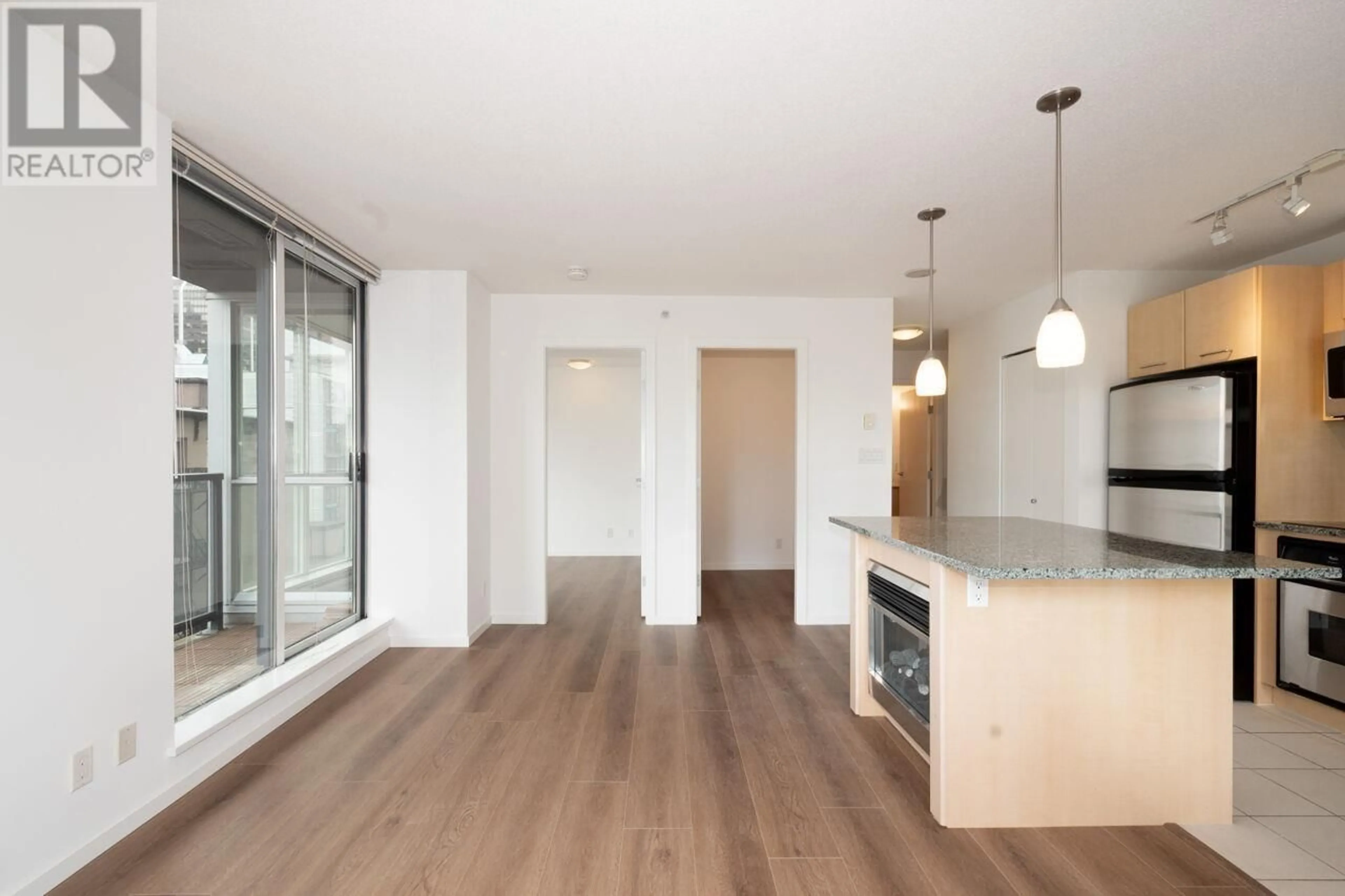 Open concept kitchen, wood/laminate floor for 708 - 1199 SEYMOUR STREET, Vancouver British Columbia V6B1K3