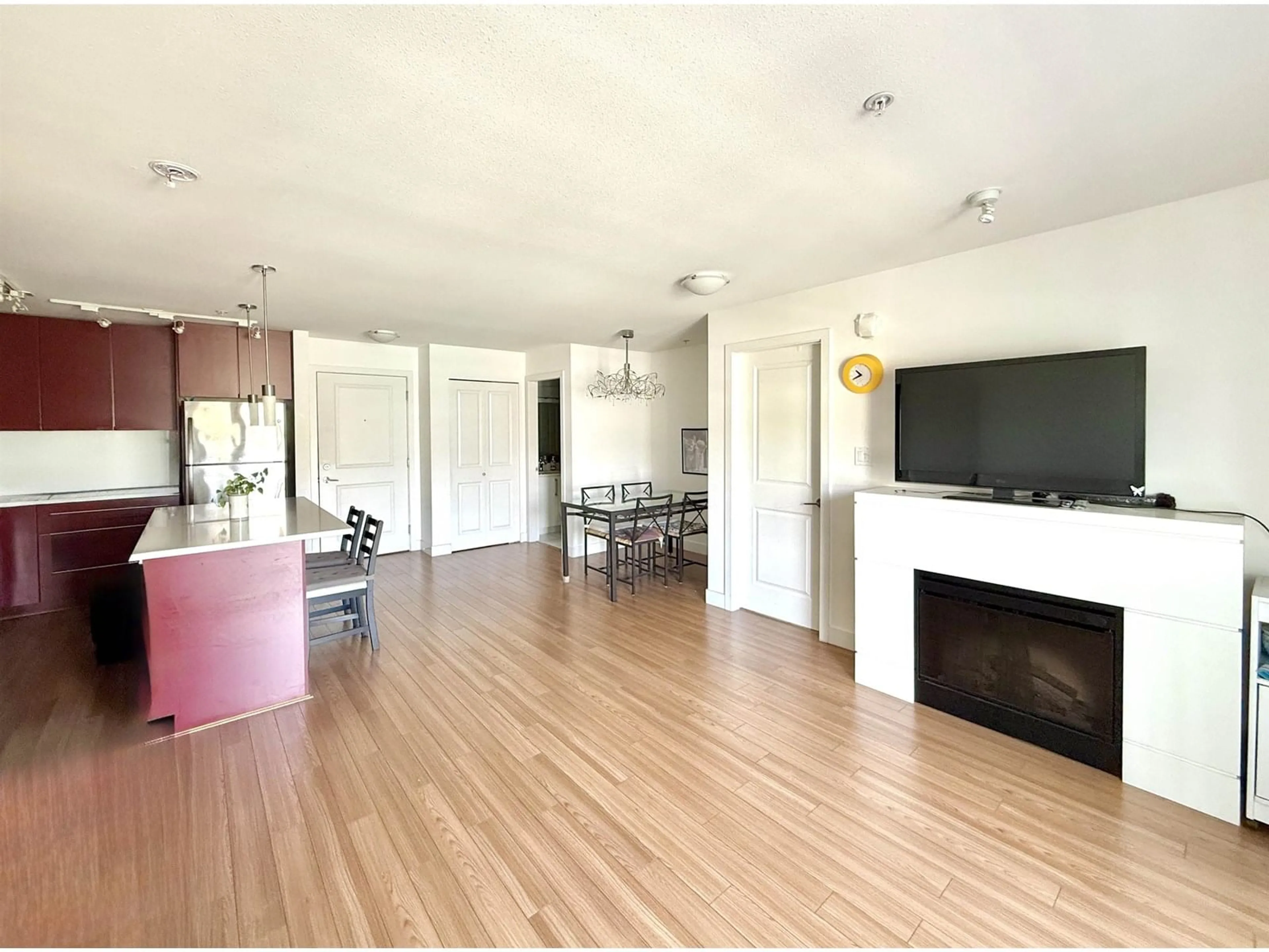 Open concept kitchen, wood/laminate floor for 205 - 15745 CROYDON, Surrey British Columbia V3Z2L5