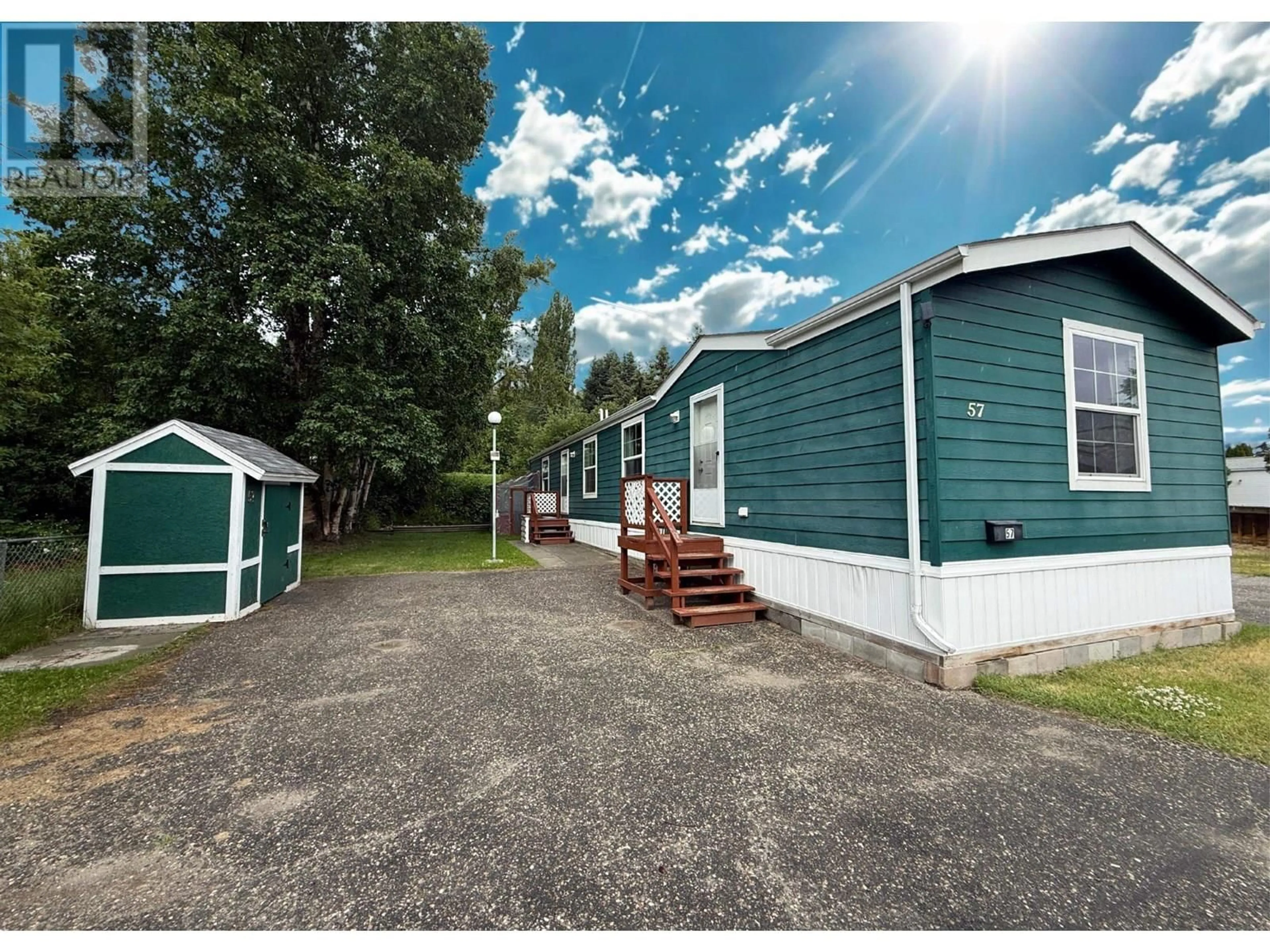 A pic from outside/outdoor area/front of a property/back of a property/a pic from drone, street for 57 - 684 NORTH FRASER DRIVE, Quesnel British Columbia V2J1Z6