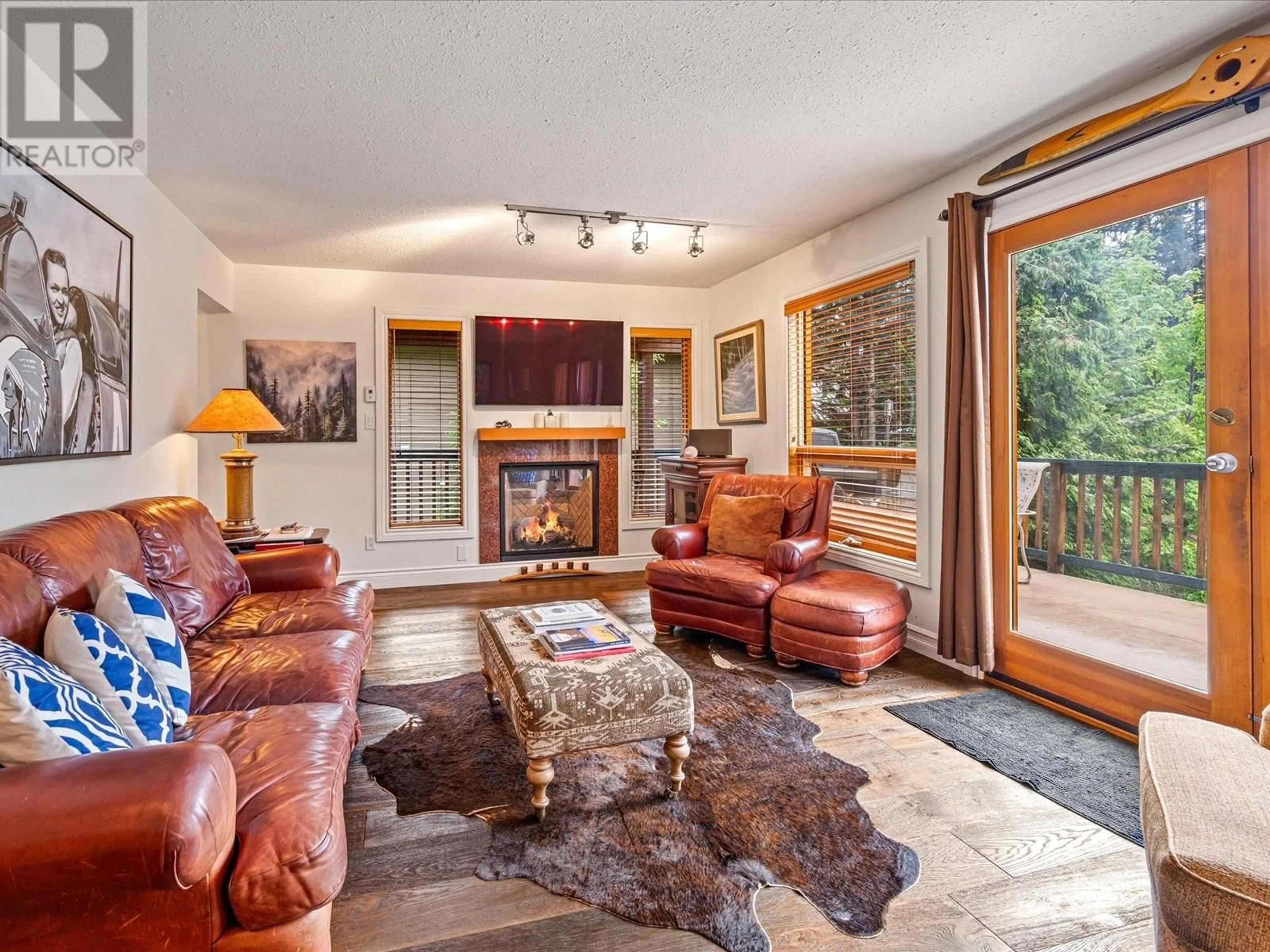 Living room with furniture, unknown for 2316 GONDOLA WAY, Whistler British Columbia V8E0N2