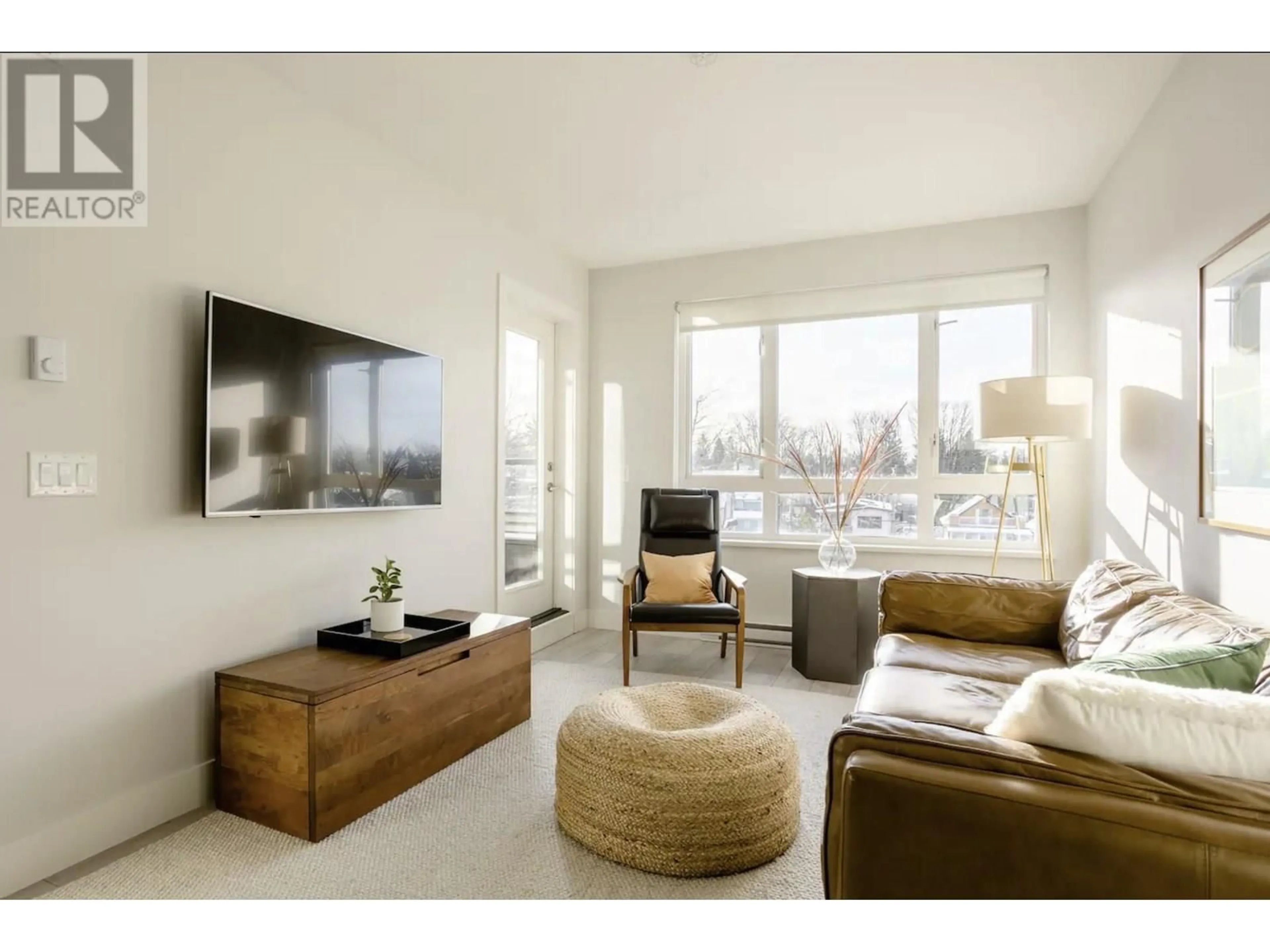 Living room with furniture, wood/laminate floor for 508 - 2477 CAROLINA STREET, Vancouver British Columbia V5T0G8