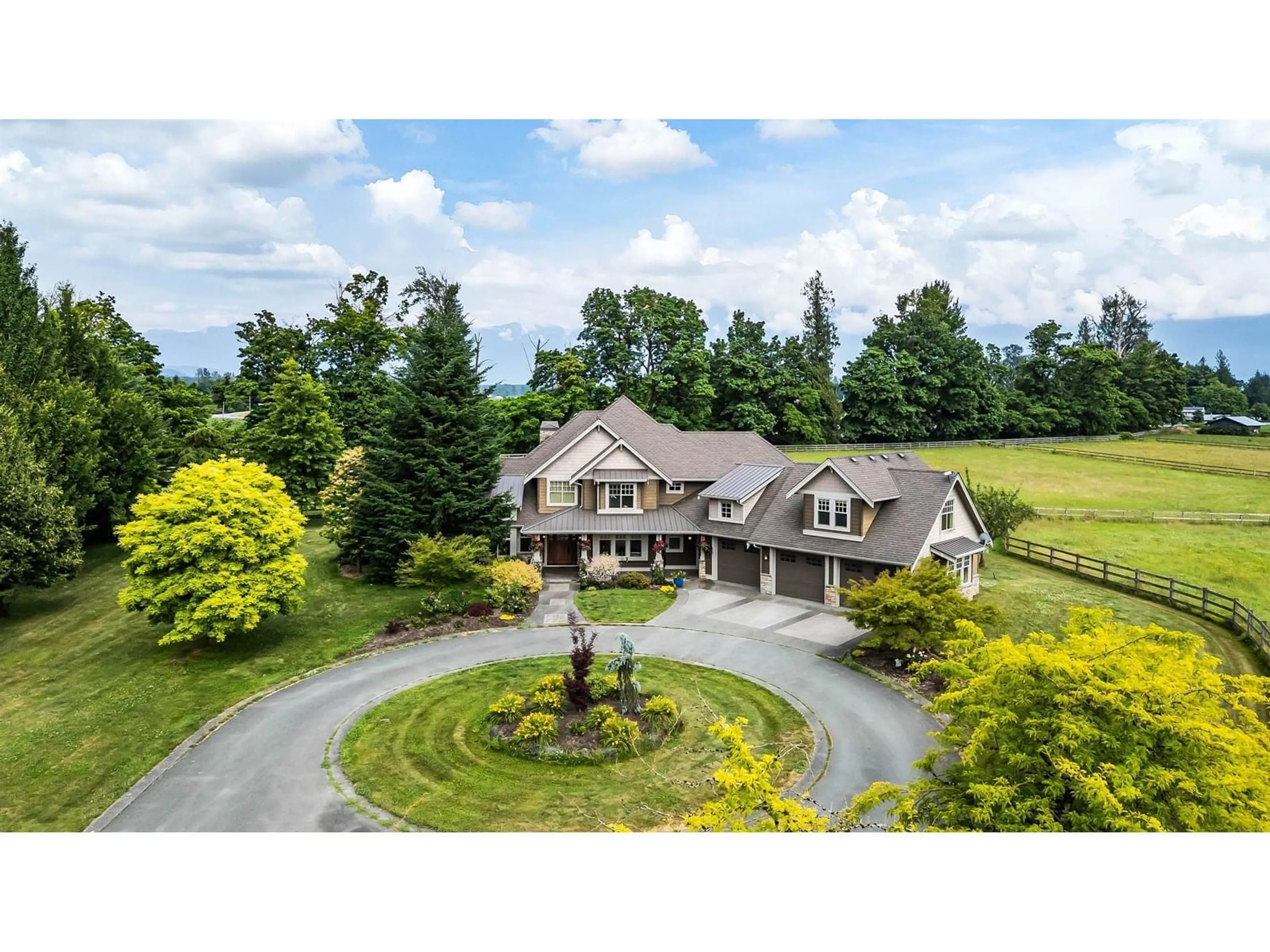 A pic from outside/outdoor area/front of a property/back of a property/a pic from drone, mountain view for 11288 MCSWEEN ROAD, Chilliwack British Columbia V2P6H5