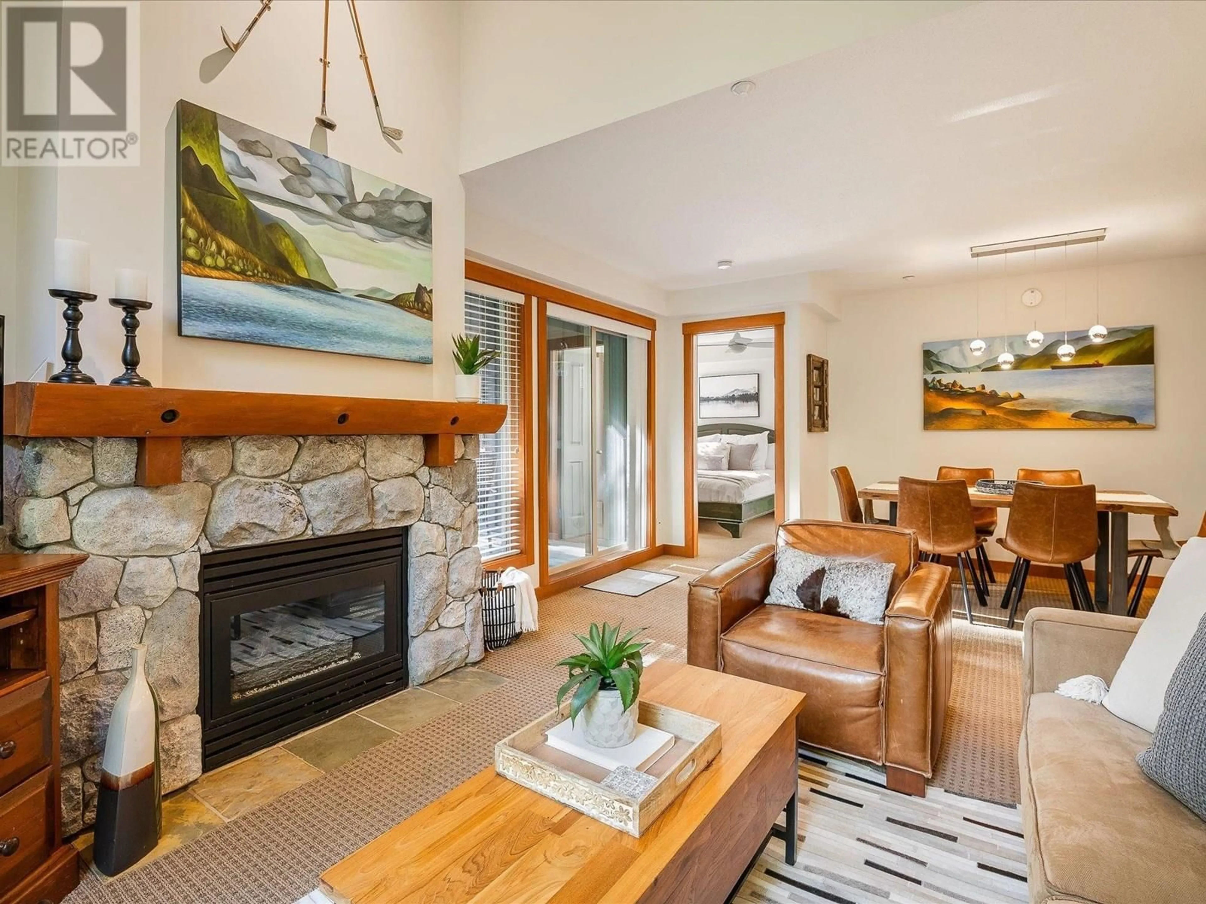 Living room with furniture, wood/laminate floor for 414 - 4660 BLACKCOMB WAY, Whistler British Columbia V8E0Y8