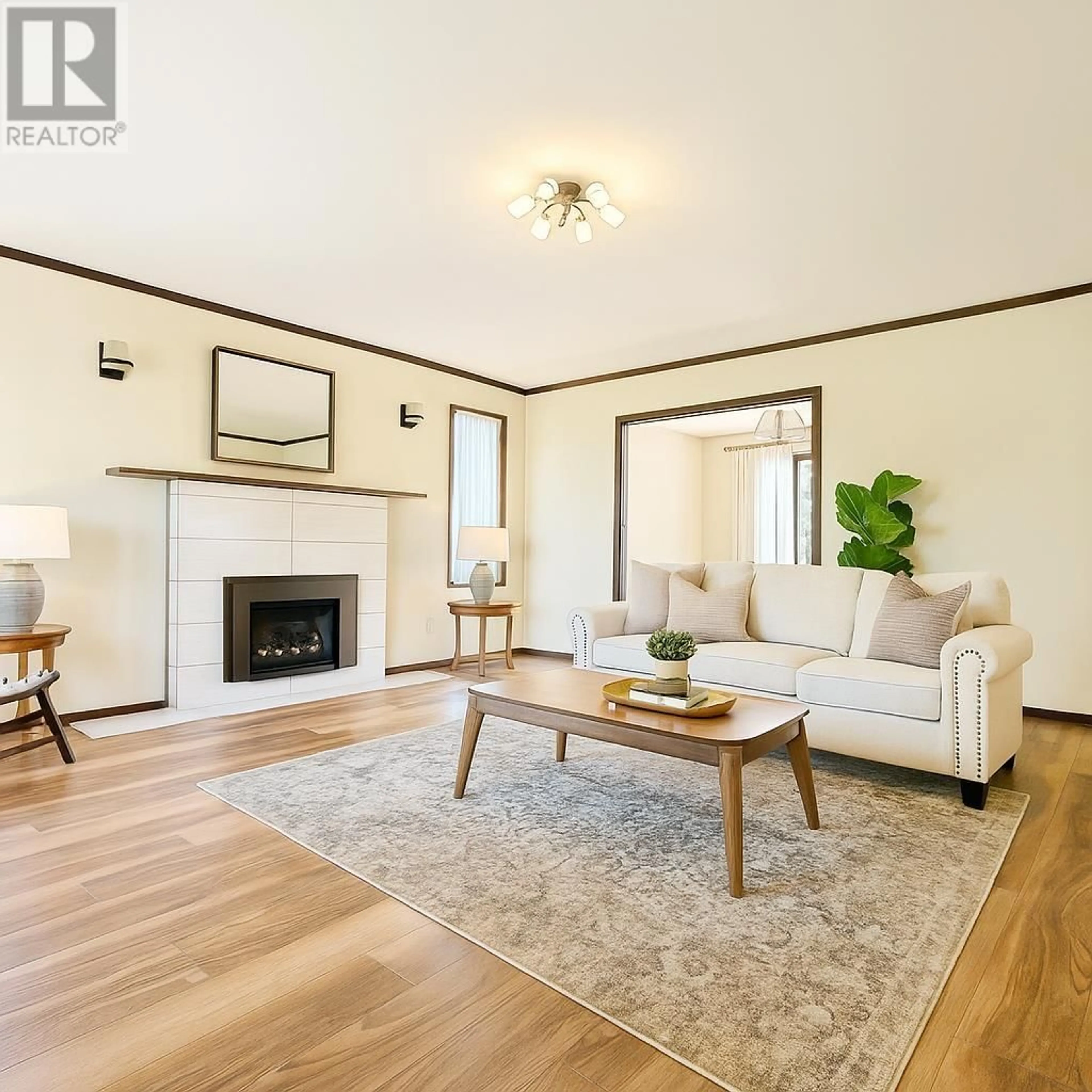 Living room with furniture, wood/laminate floor for 1652 61ST AVENUE, Vancouver British Columbia V6P2C3