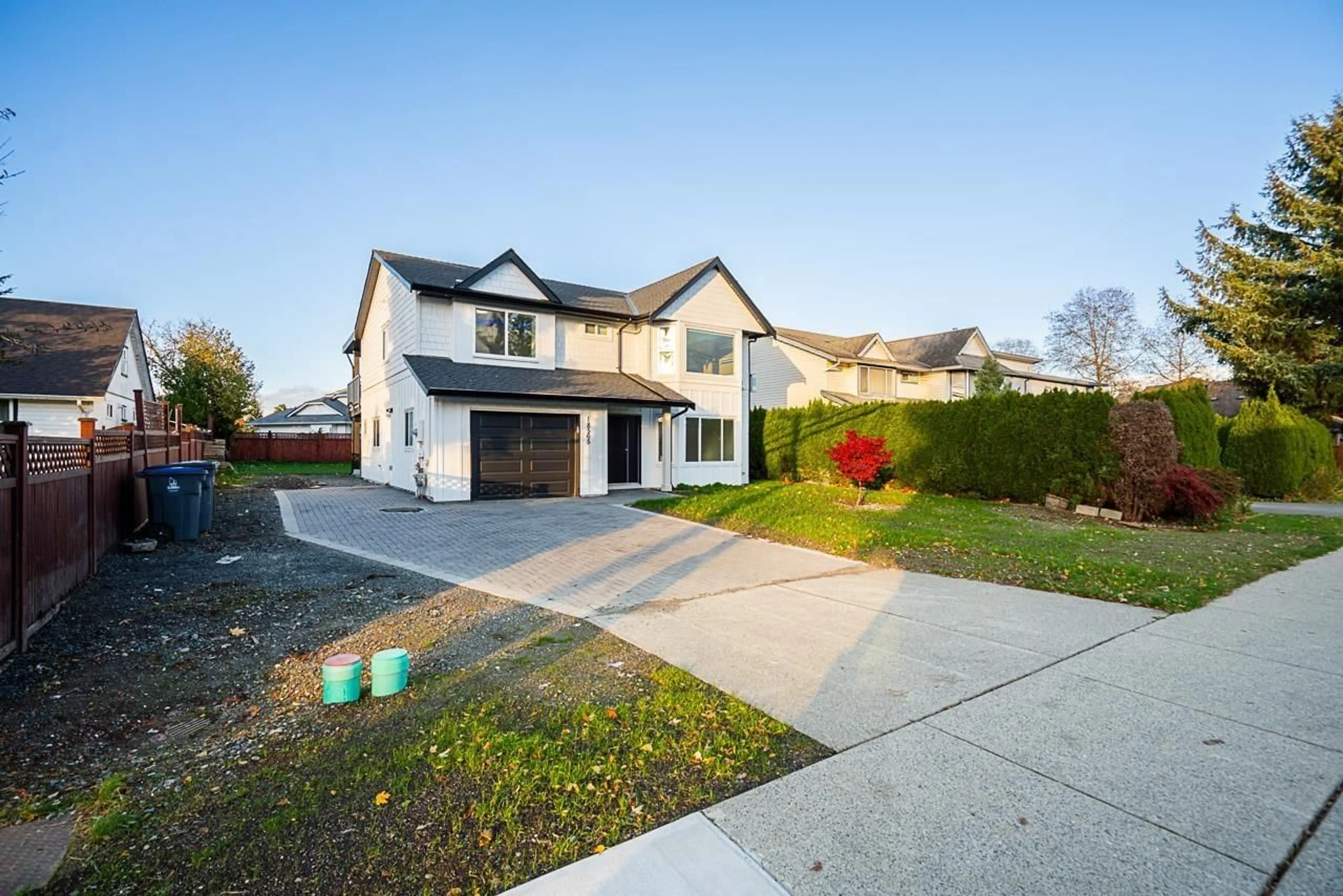 A pic from outside/outdoor area/front of a property/back of a property/a pic from drone, street for 18565 60, Surrey British Columbia V3S8T6