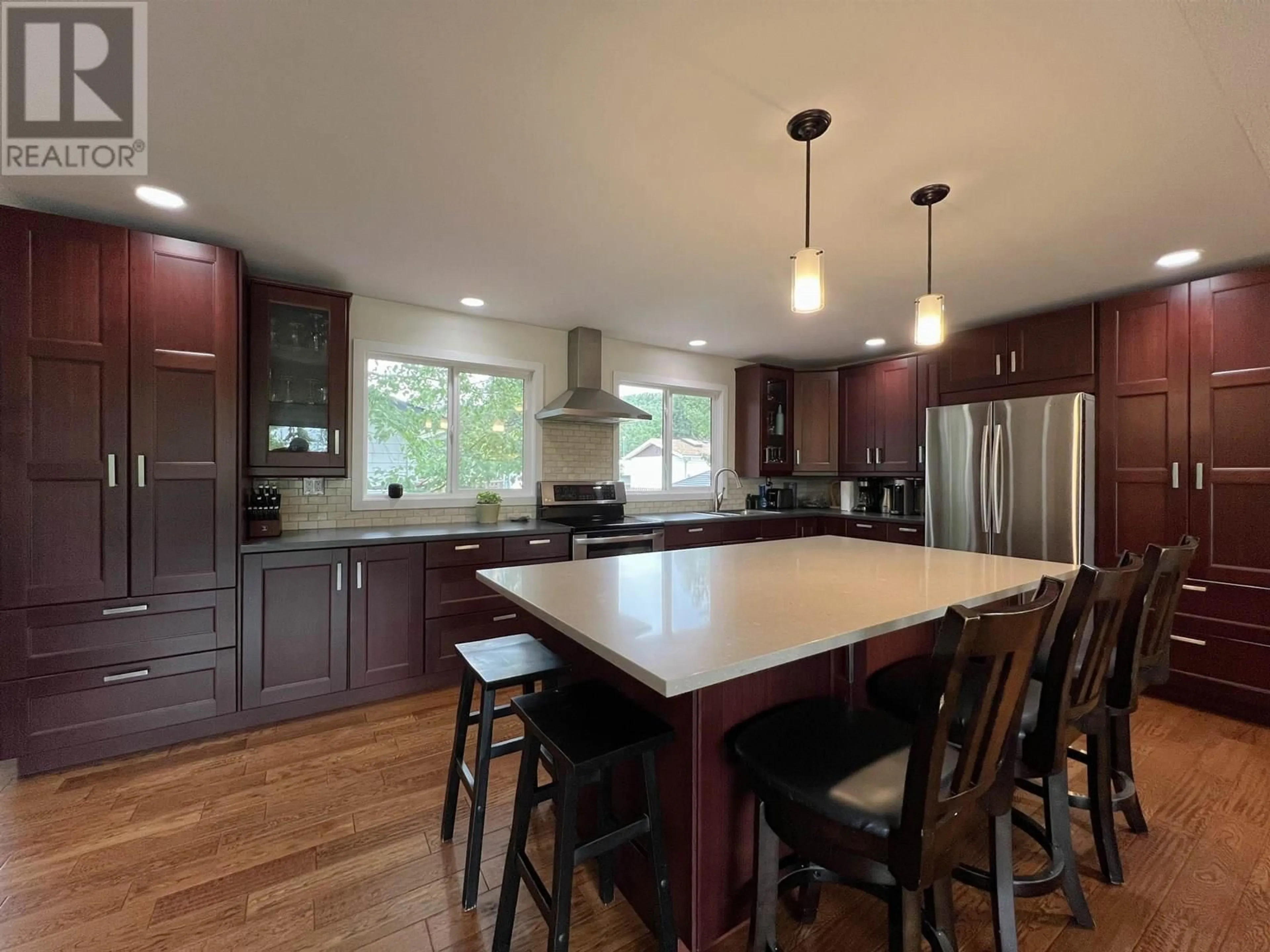 Open concept kitchen, wood/laminate floor for 4129 22ND AVENUE, Prince George British Columbia V2N3N3