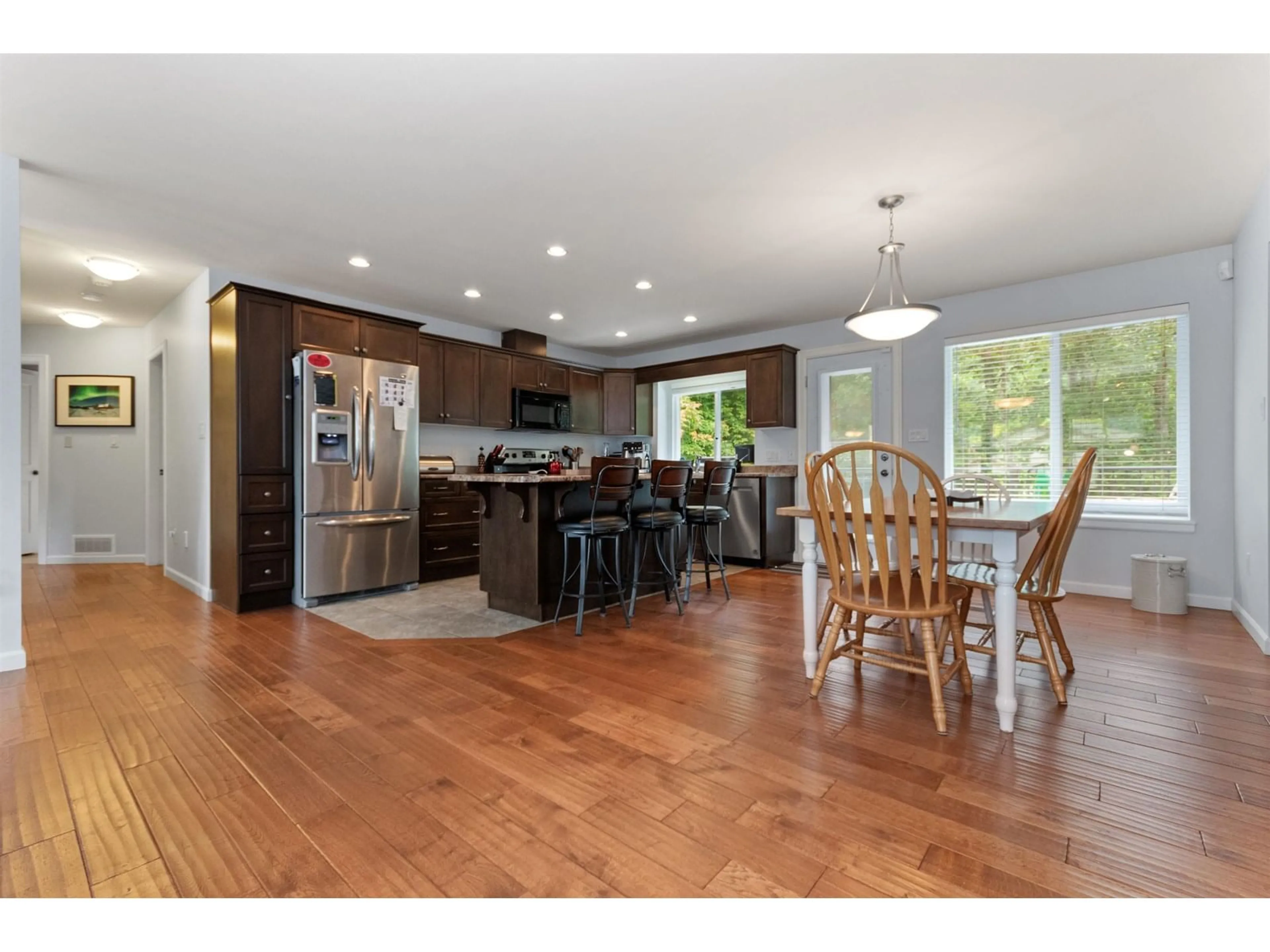 Open concept kitchen, wood/laminate floor for 65886 PARK AVENUE, Hope British Columbia V0X1L1