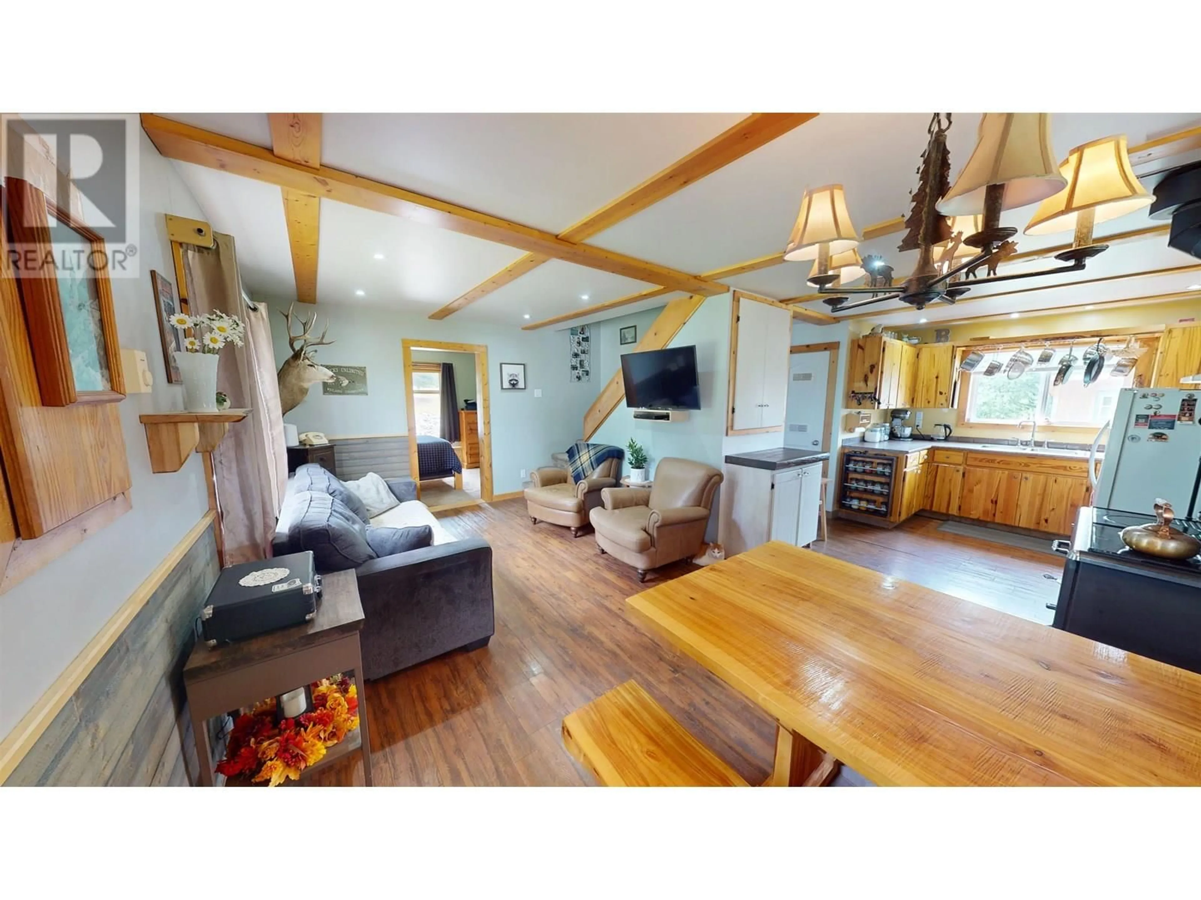 Living room with furniture, wood/laminate floor for 4793 POLLARD ROAD, Quesnel British Columbia V2J6X5