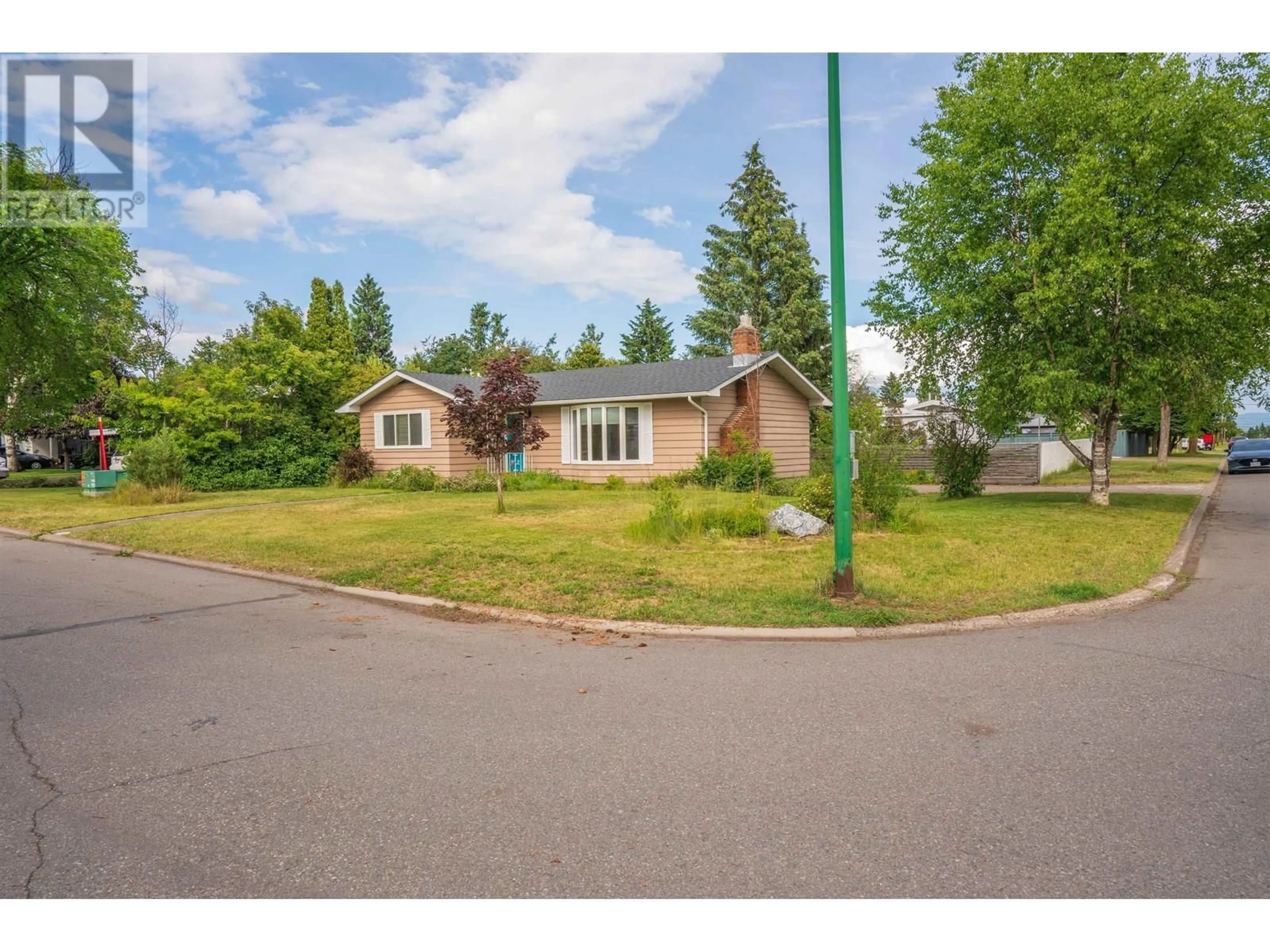 A pic from outside/outdoor area/front of a property/back of a property/a pic from drone, street for 208 RILEY DRIVE, Prince George British Columbia V2M3P1