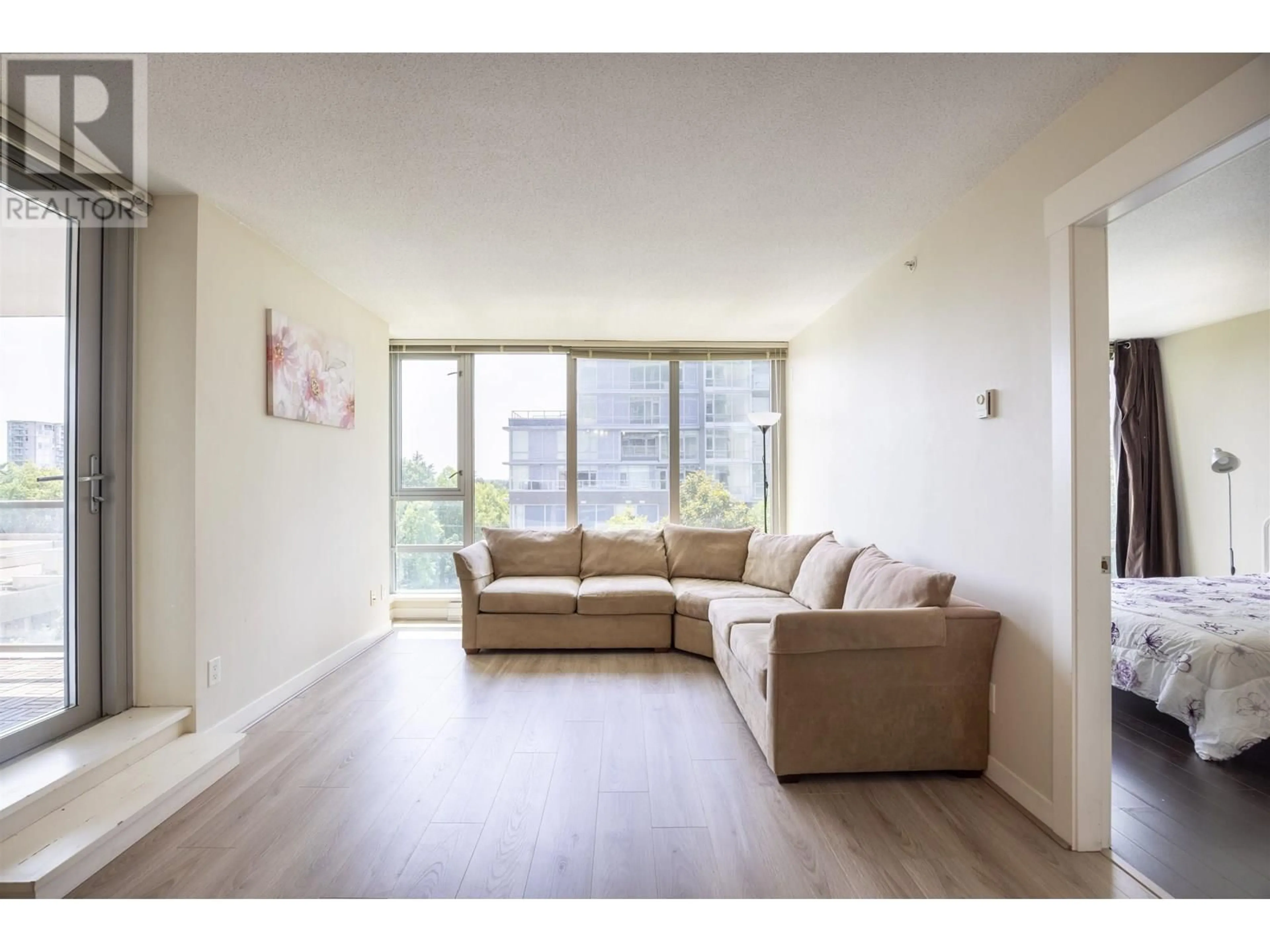 Living room with furniture, wood/laminate floor for 809 - 6733 BUSWELL STREET, Richmond British Columbia V6Y0E3