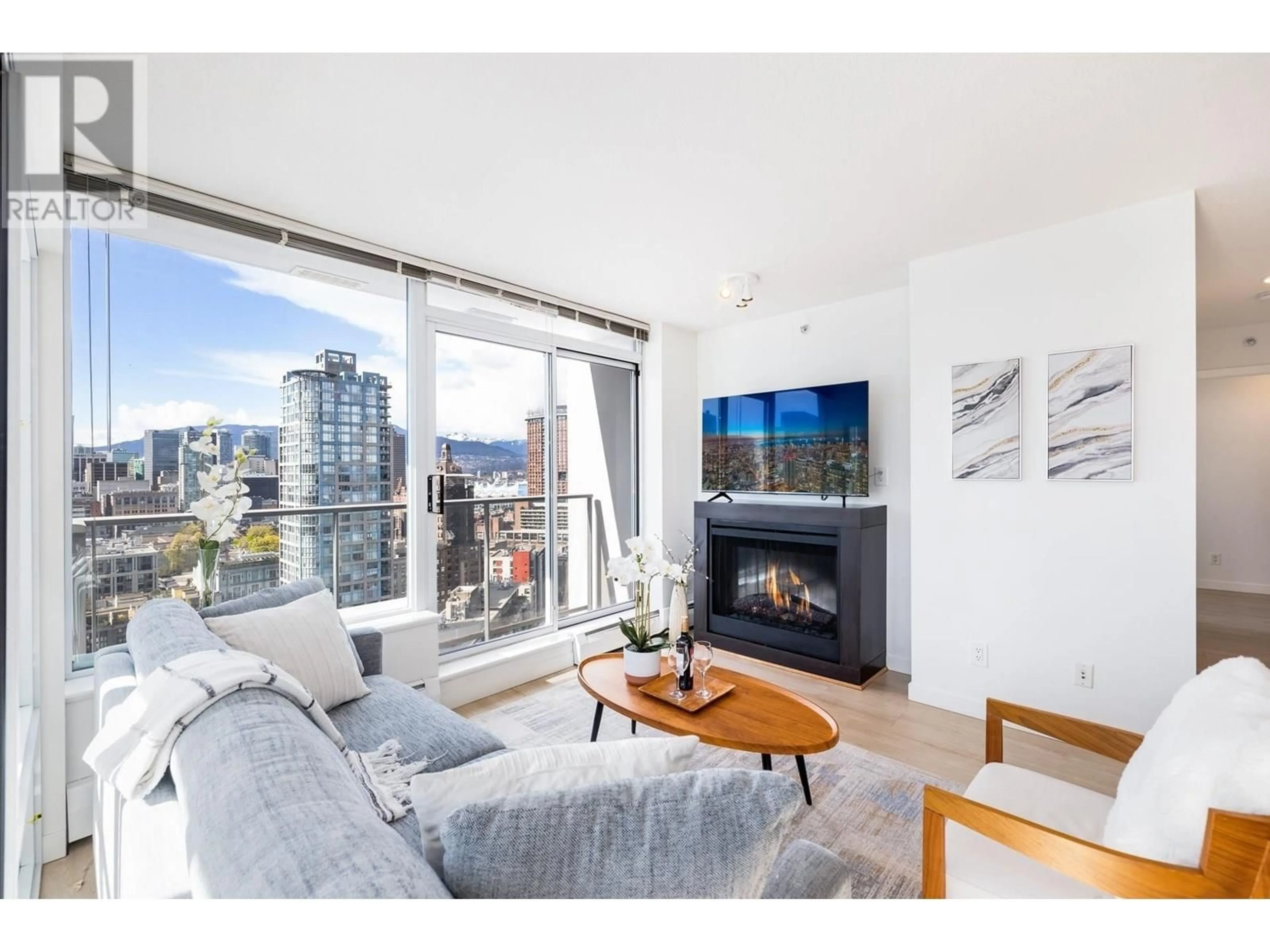 Living room with furniture, wood/laminate floor for 2906 - 688 ABBOTT STREET, Vancouver British Columbia V6B0B9