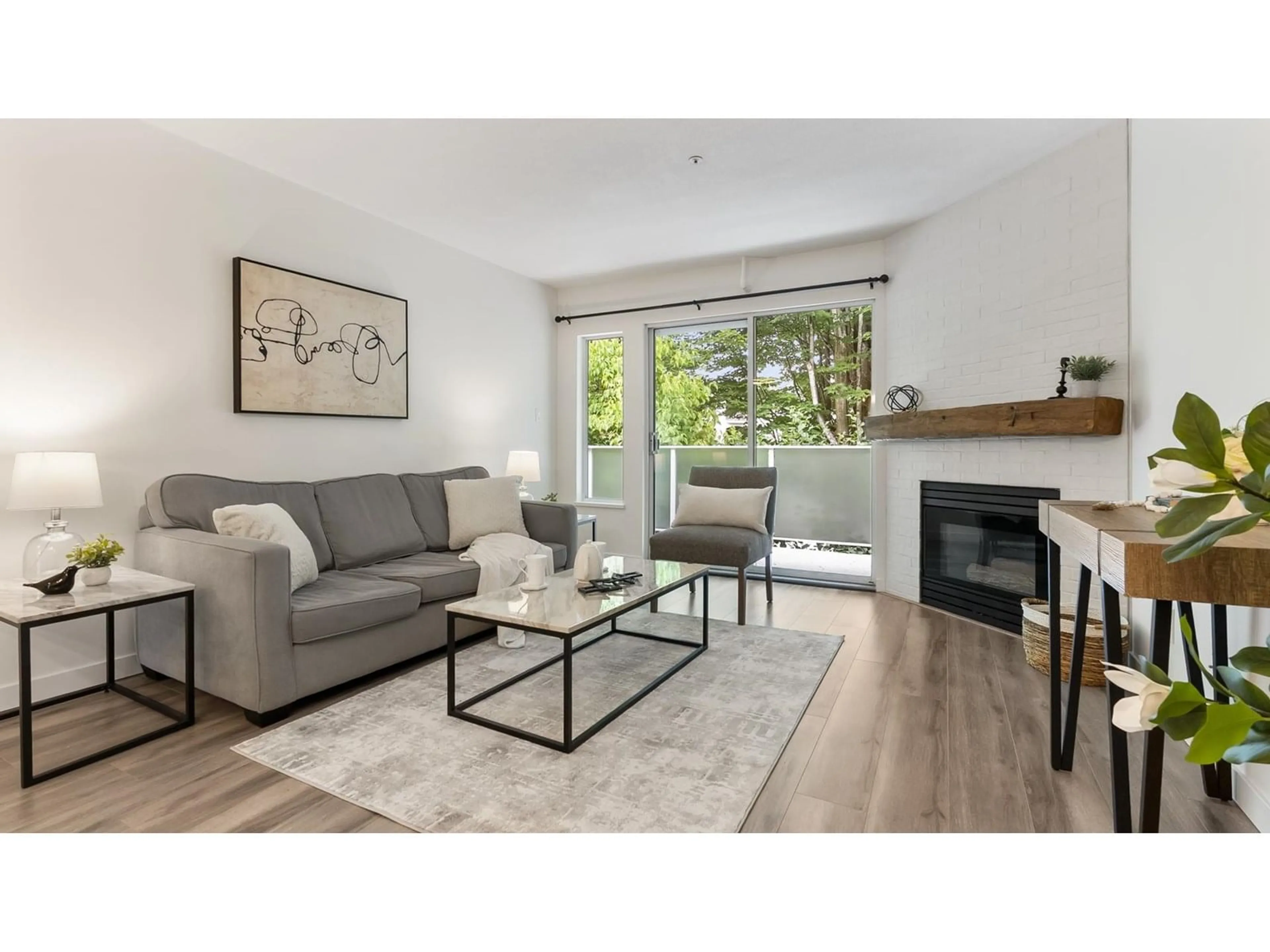 Living room with furniture, wood/laminate floor for 35 - 5668 208, Langley British Columbia V3A8G4