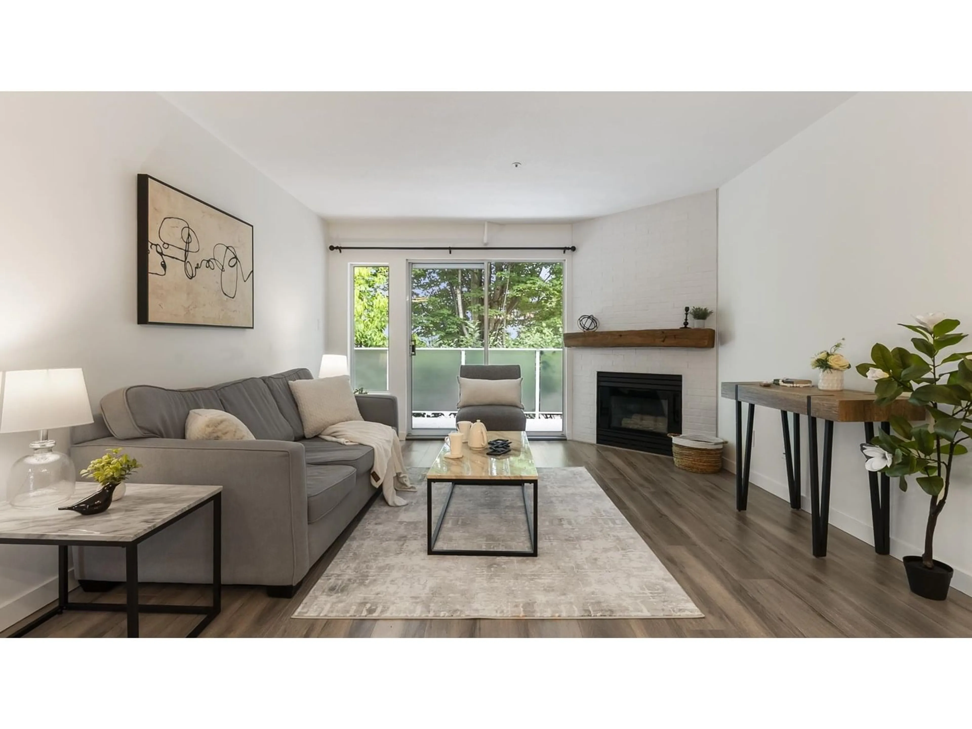 Living room with furniture, wood/laminate floor for 35 - 5668 208, Langley British Columbia V3A8G4