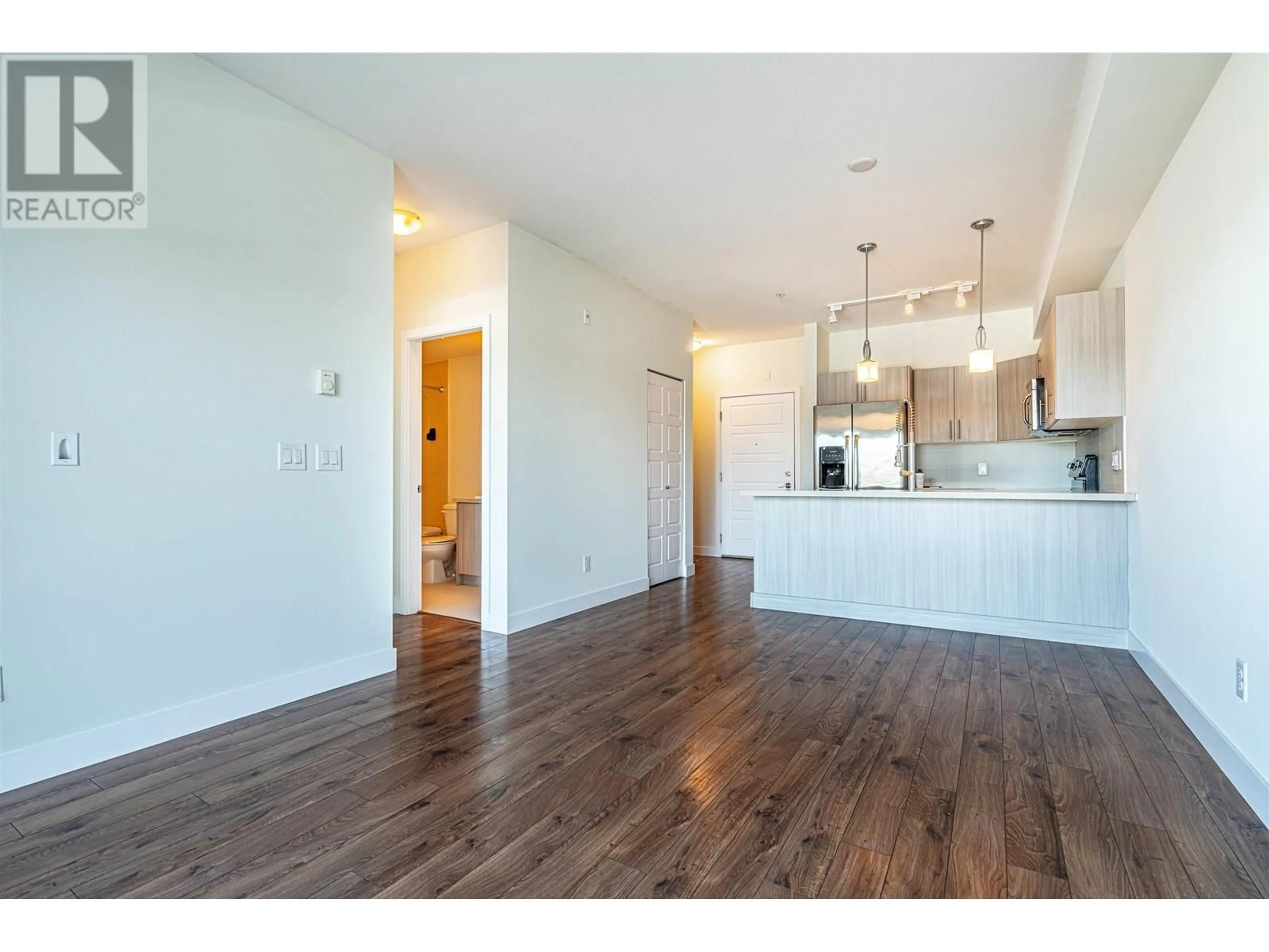Open concept kitchen, wood/laminate floor for 310 - 12070 227 STREET, Maple Ridge British Columbia V2X9H2