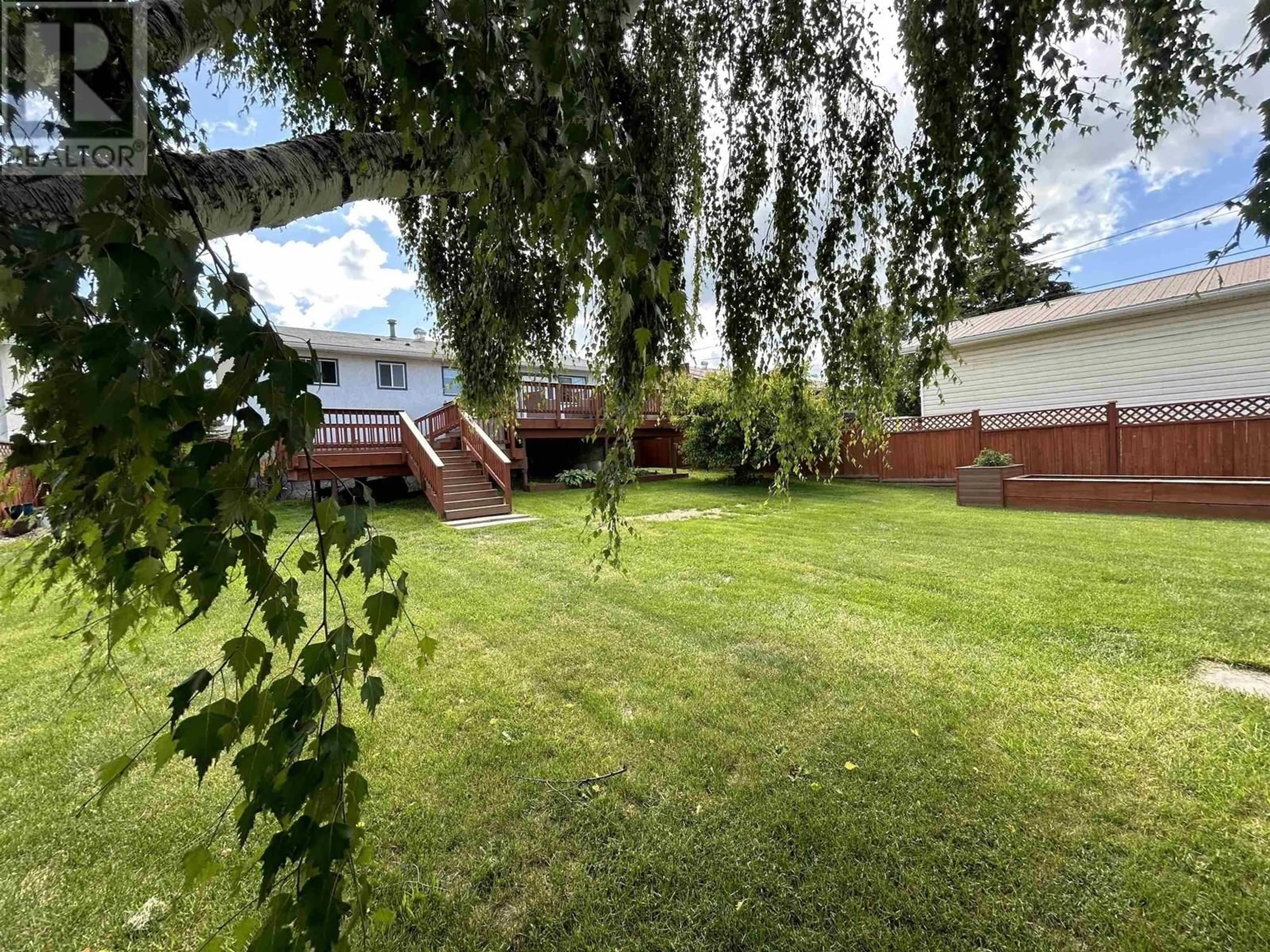 A pic from outside/outdoor area/front of a property/back of a property/a pic from drone, unknown for 9808 113 AVENUE, Fort St. John British Columbia V1J4P6