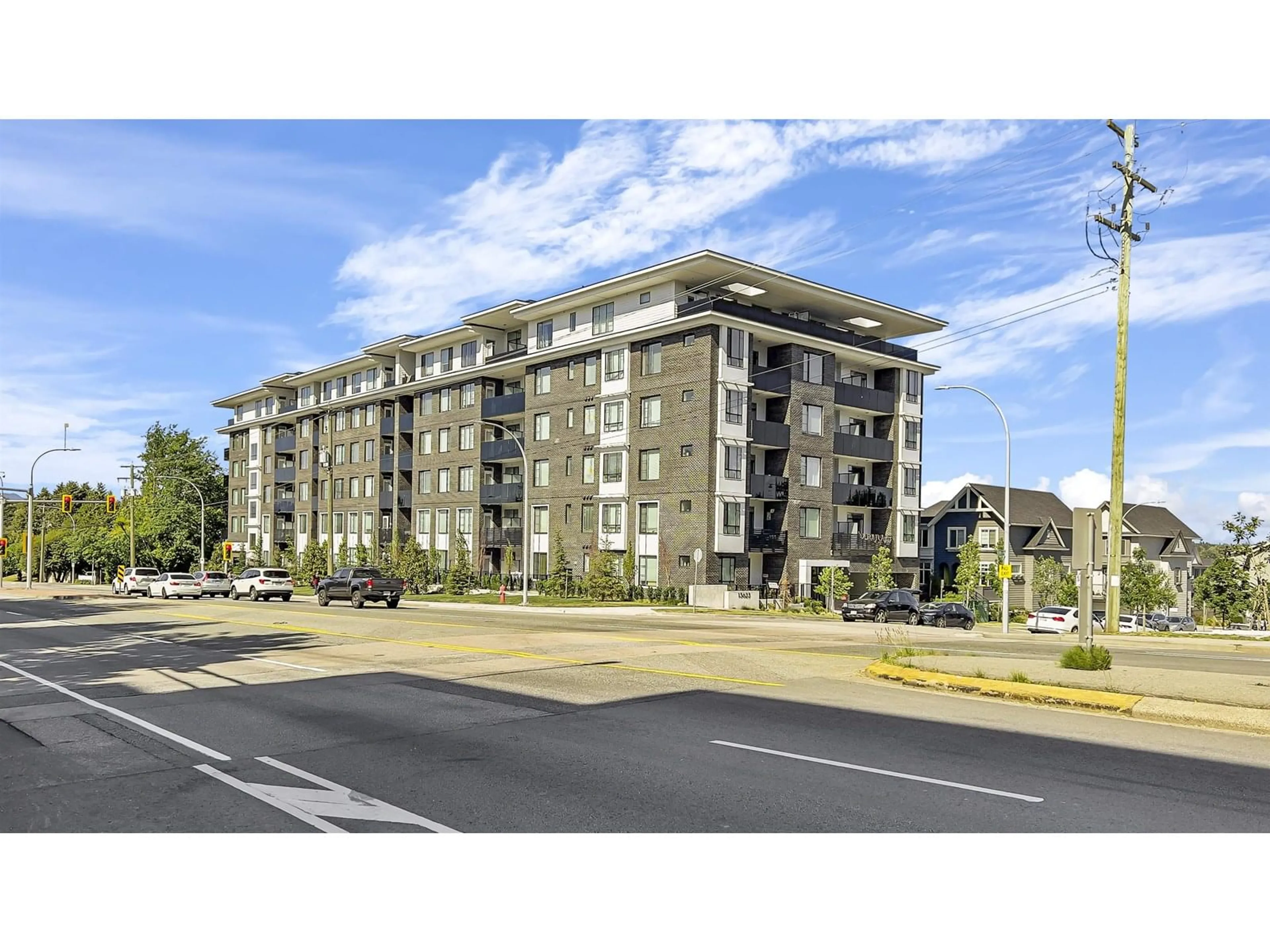 A pic from outside/outdoor area/front of a property/back of a property/a pic from drone, unknown for 306 - 13623 81A, Surrey British Columbia V3W3N7