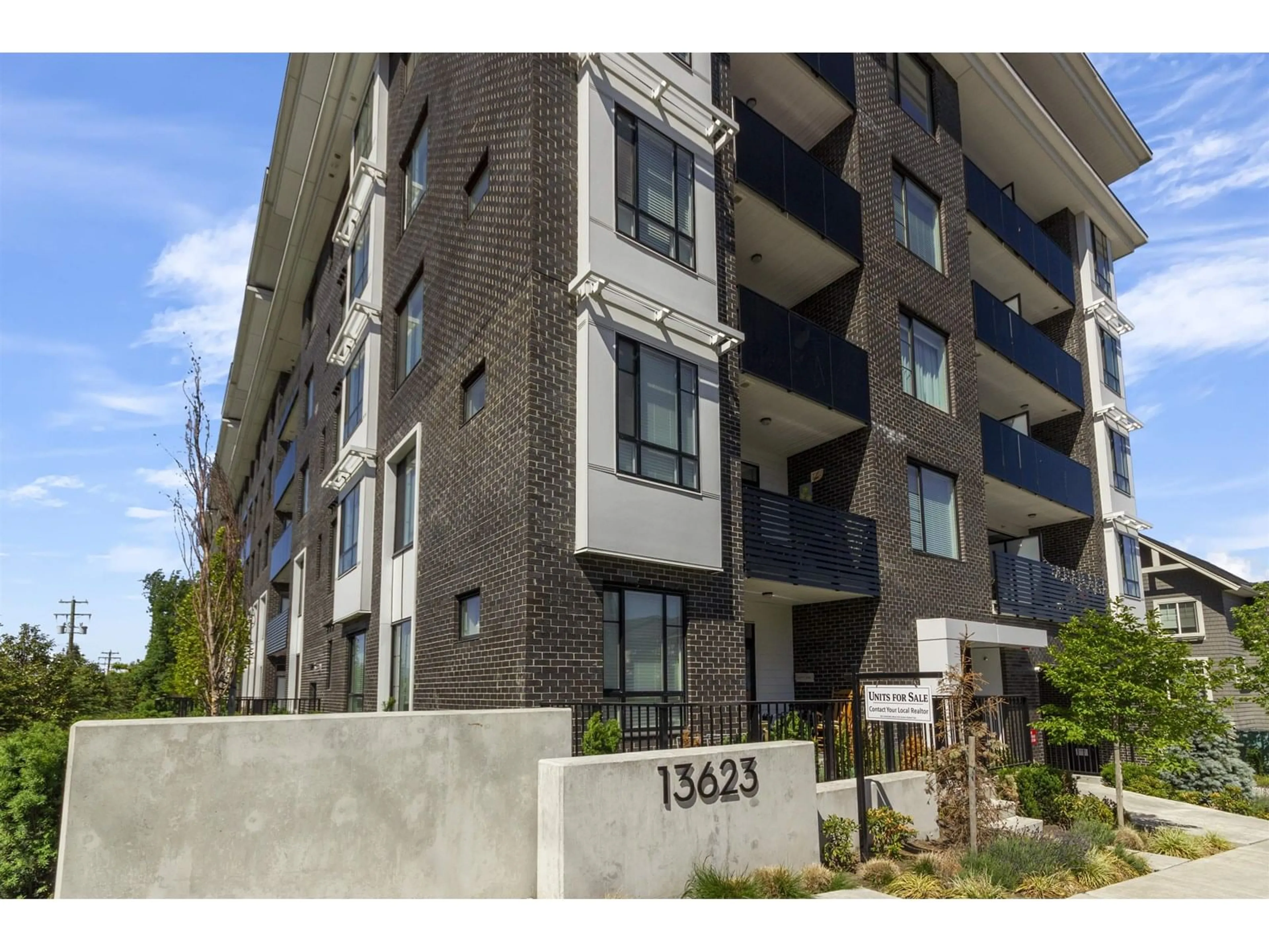 A pic from outside/outdoor area/front of a property/back of a property/a pic from drone, street for 306 - 13623 81A, Surrey British Columbia V3W3N7