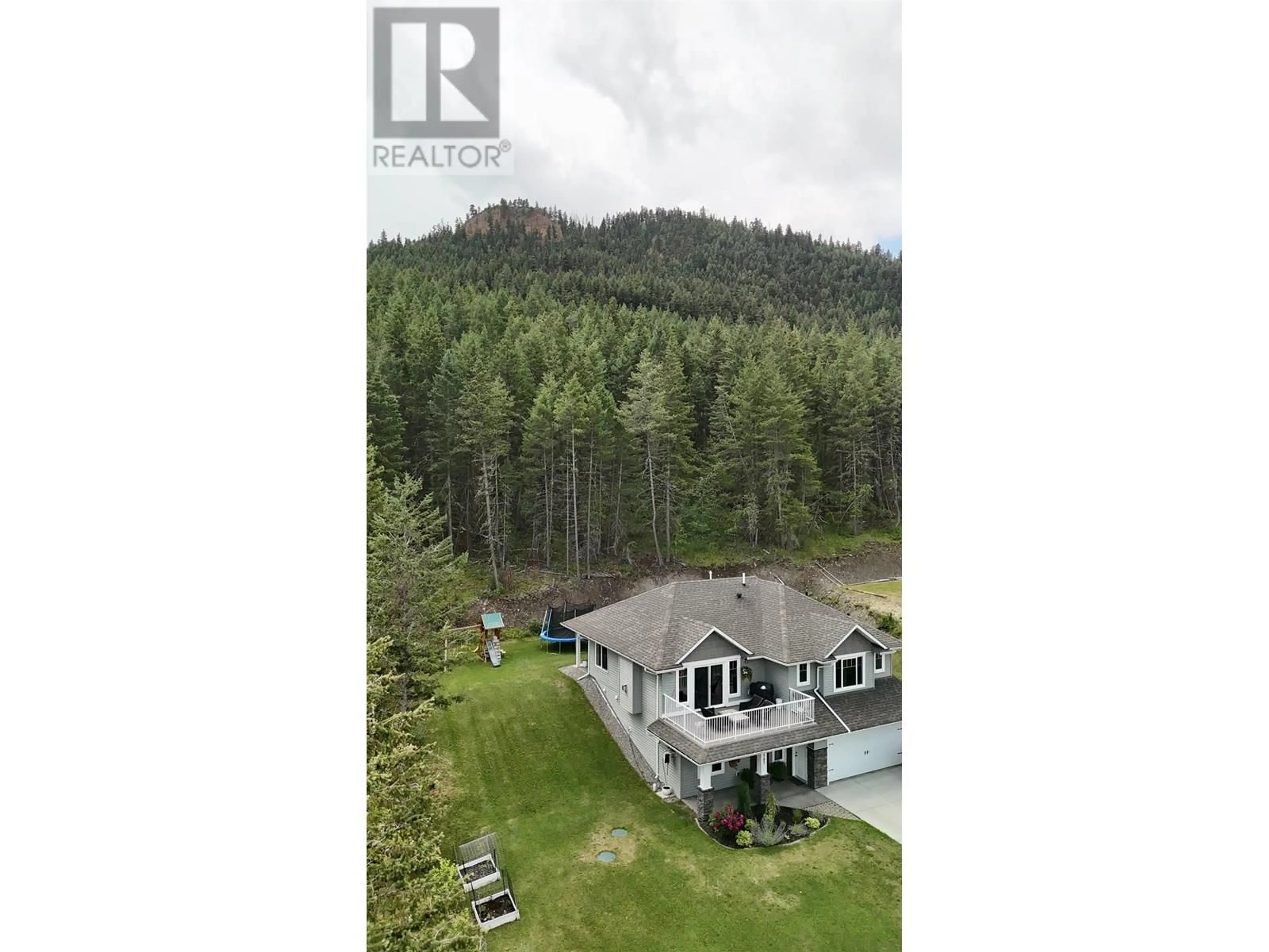 A pic from outside/outdoor area/front of a property/back of a property/a pic from drone, forest/trees view for 2167 BLUFF VIEW DRIVE, Williams Lake British Columbia V2G5G2