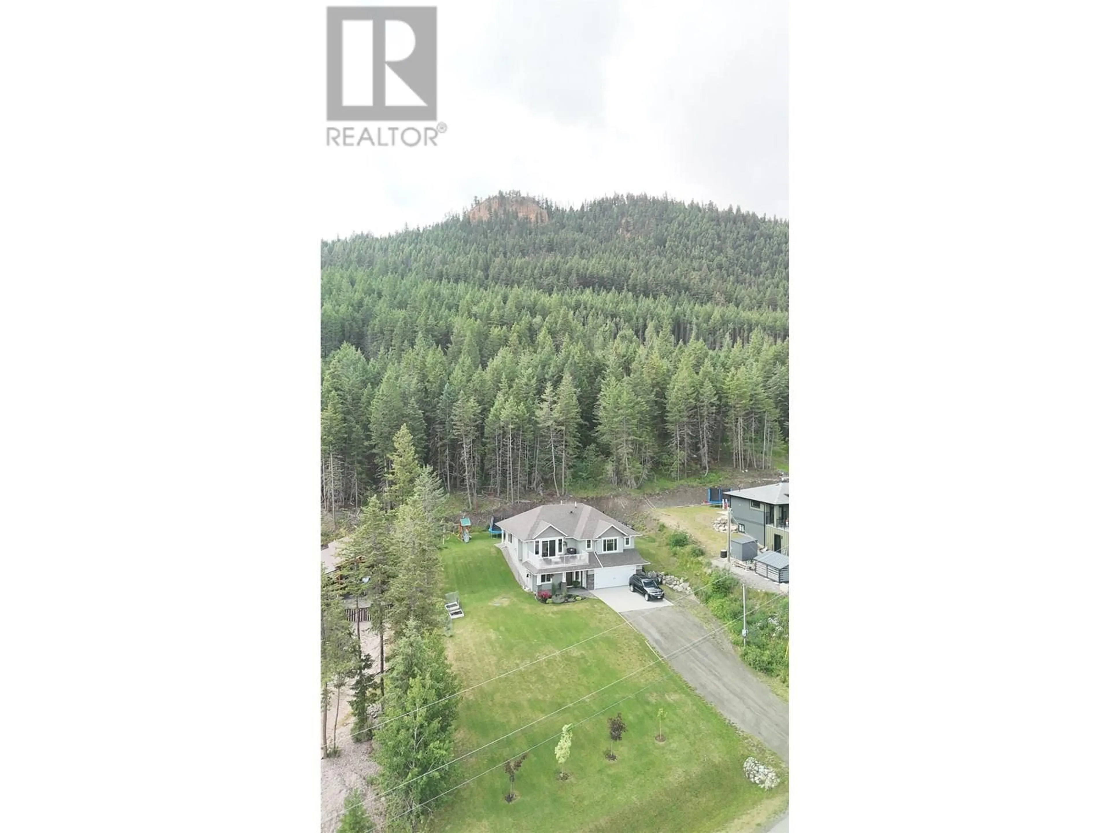 A pic from outside/outdoor area/front of a property/back of a property/a pic from drone, forest/trees view for 2167 BLUFF VIEW DRIVE, Williams Lake British Columbia V2G5G2