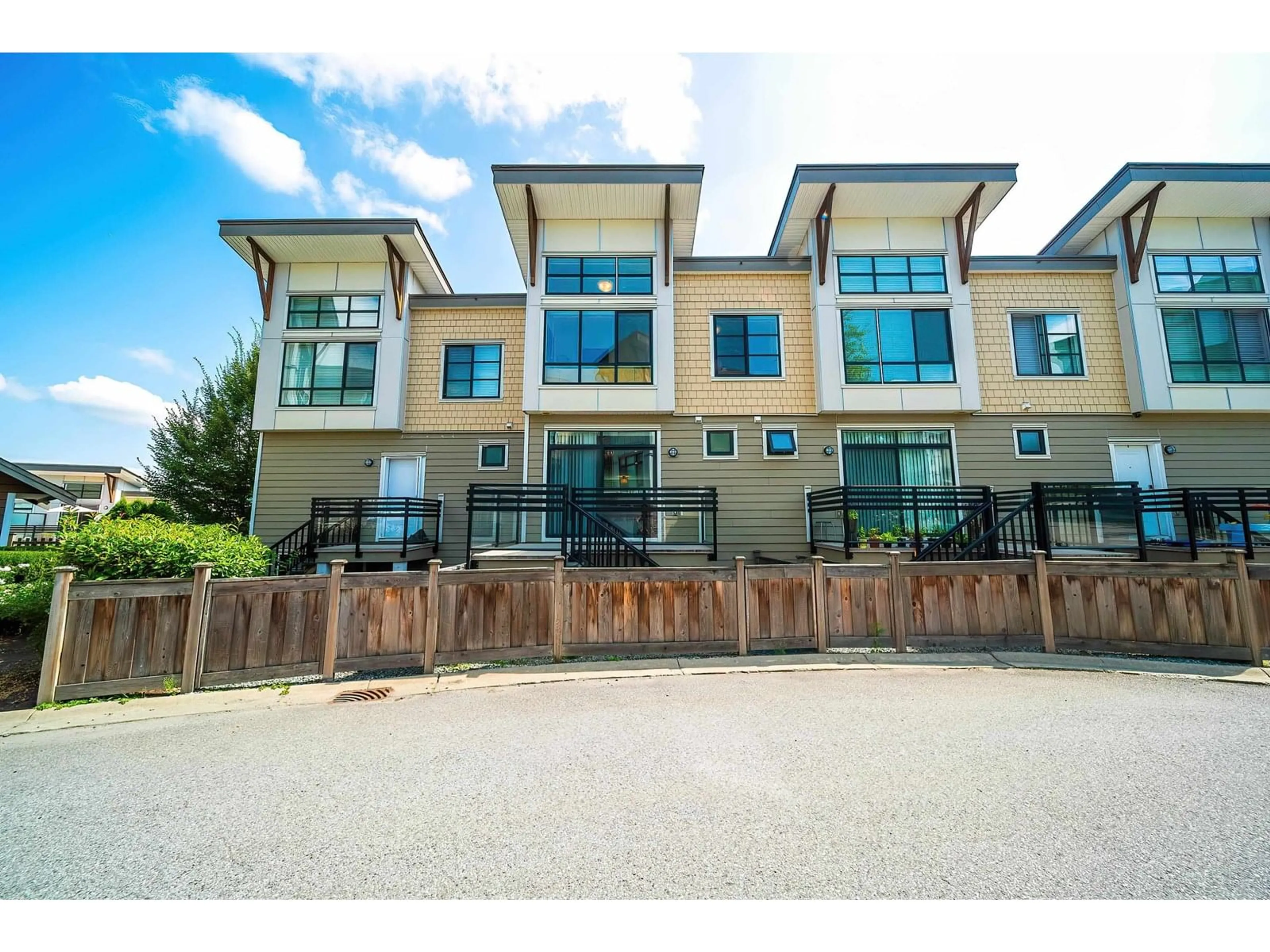 A pic from outside/outdoor area/front of a property/back of a property/a pic from drone, unknown for 11 - 9989 BARNSTON EAST, Surrey British Columbia V4N6N3